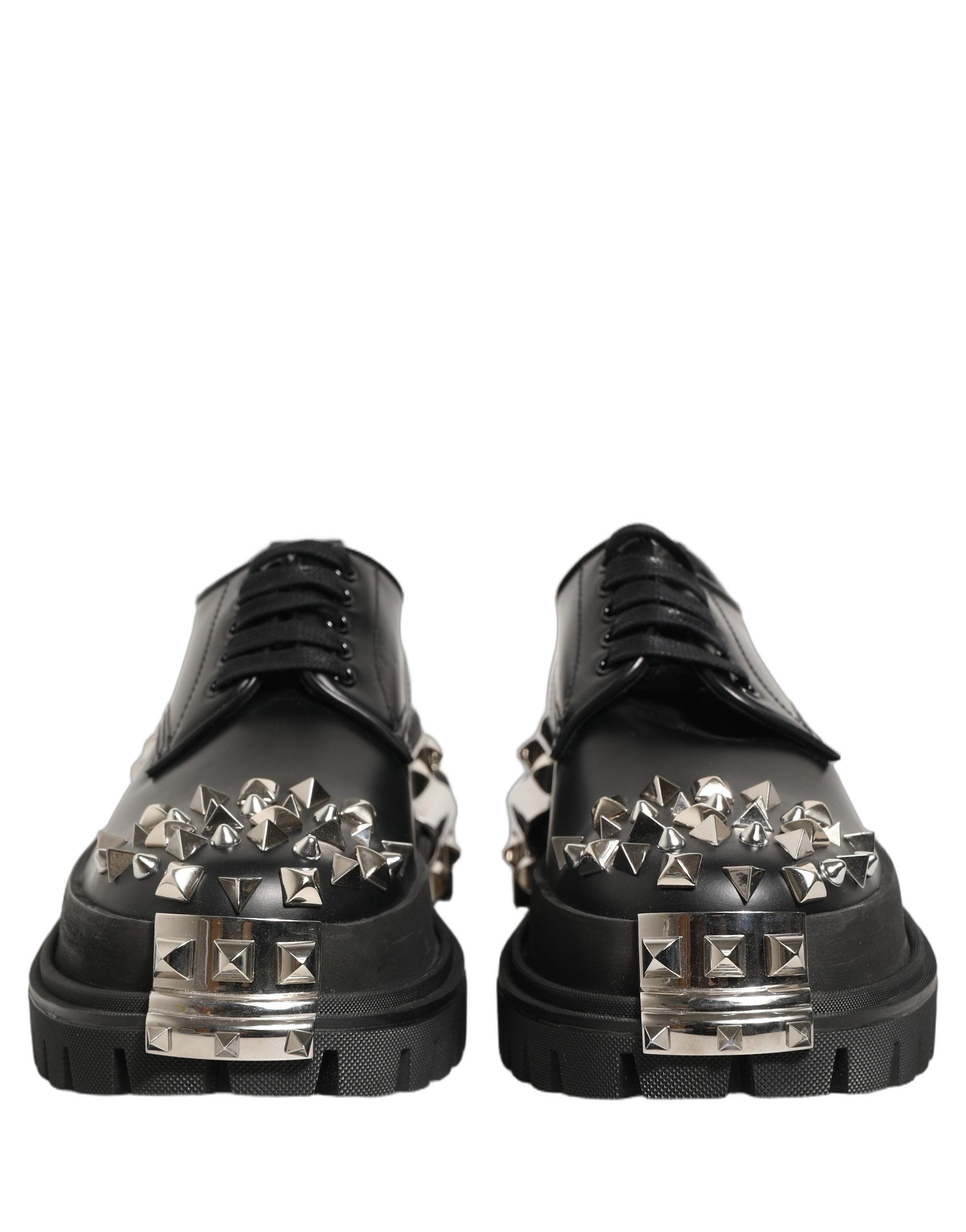 Chaussures Derby Dolce & Gabbana en cuir noir avec studs, style haut de trekking, chaussures élégantes en cuir robustes.
