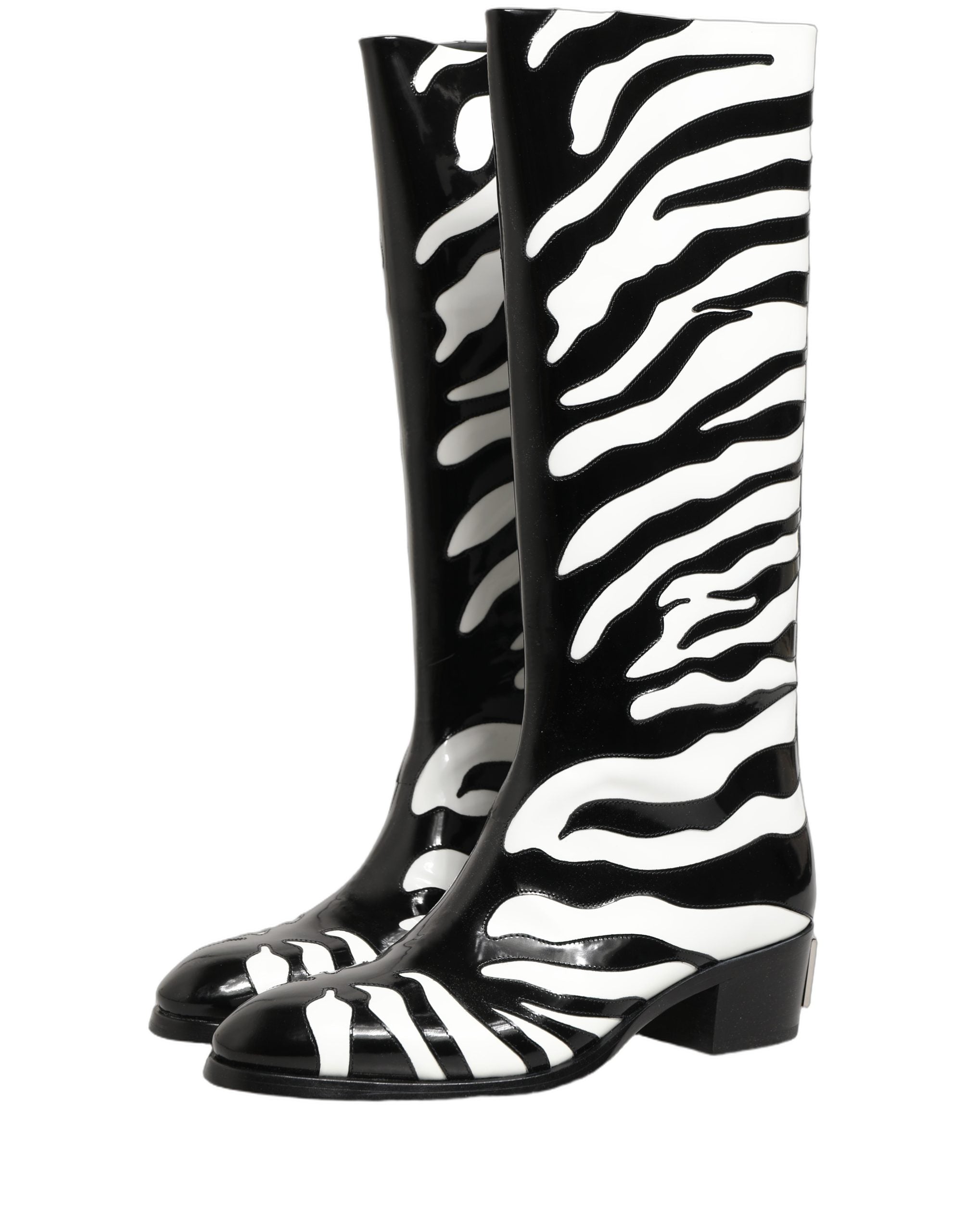 Bottes homme mi-mollet Dolce & Gabbana à imprimé zèbre noir et blanc, style élégant et tendance, en cuir.