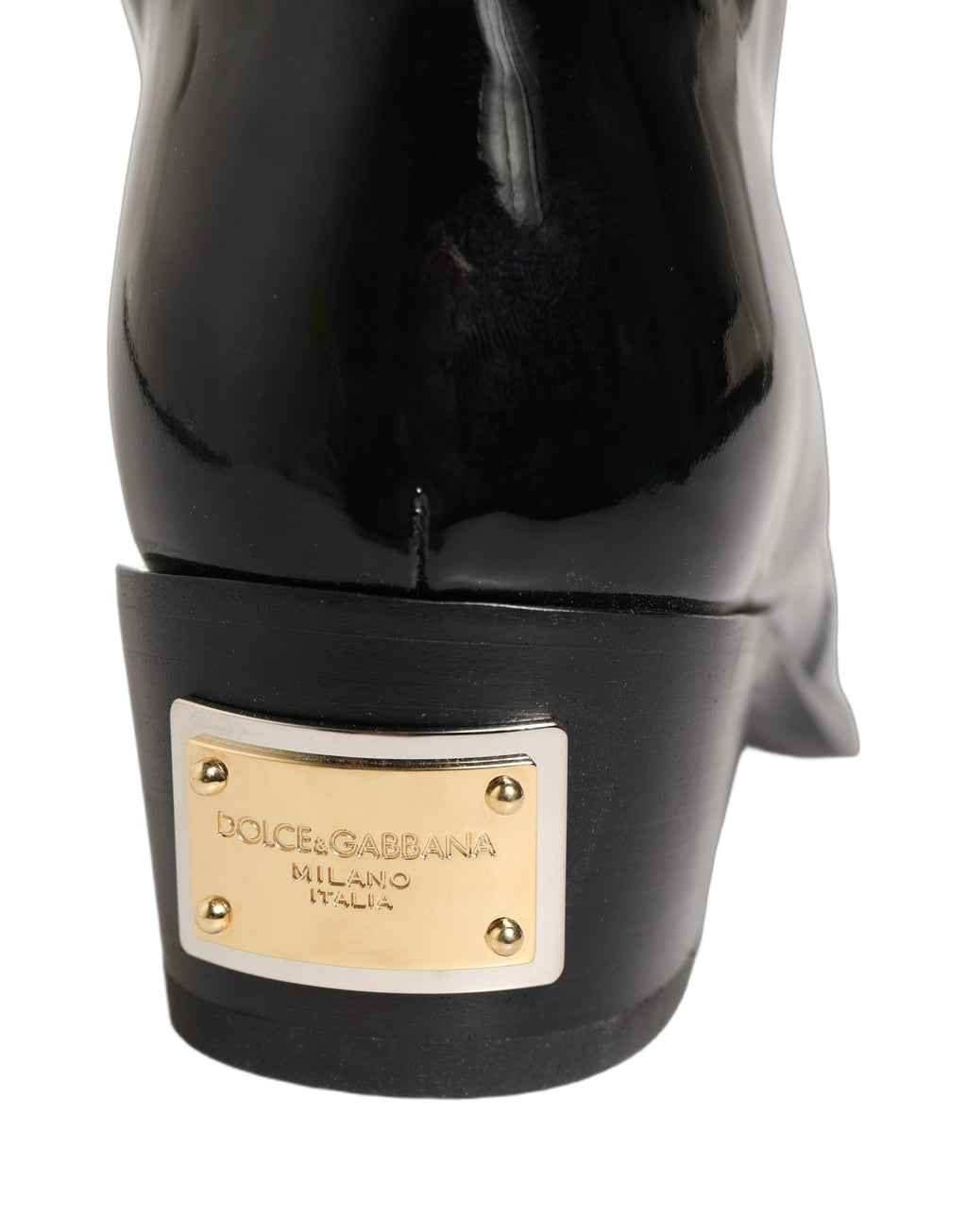 Bottes noires en cuir Dolce & Gabbana, cuissardes élégantes avec talons hauts et design sophistiqué.