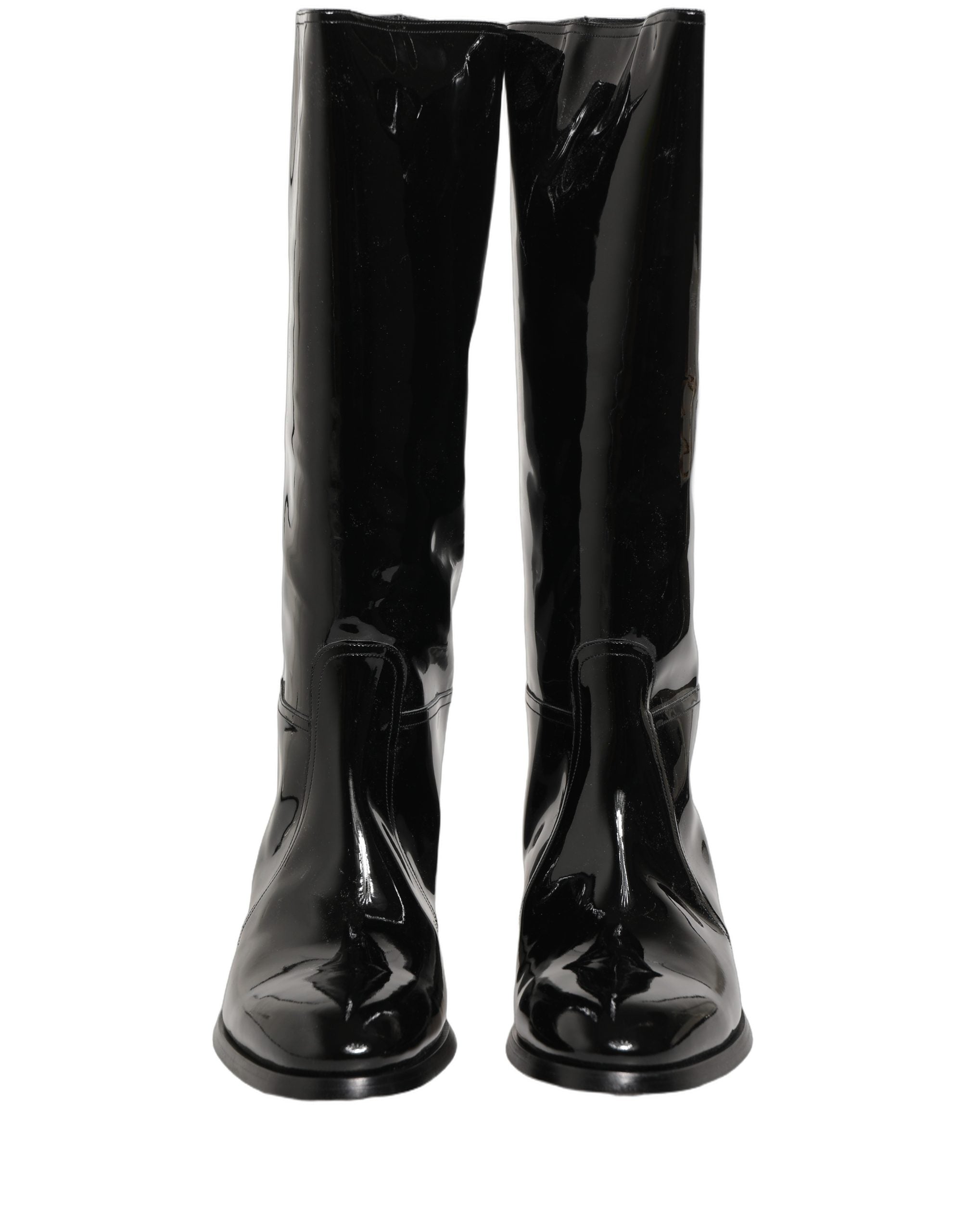 Bottes noires en cuir Dolce & Gabbana, cuissardes élégantes avec talons hauts et finition sophistiquée.