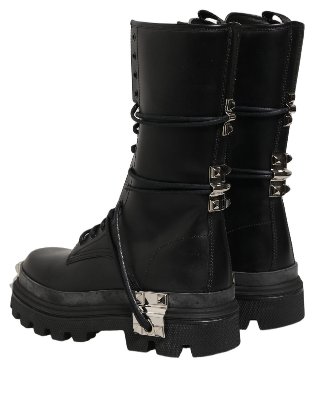 Bottes noires Dolce & Gabbana en cuir avec semelle plateforme à clous et style combat, pour un look audacieux.