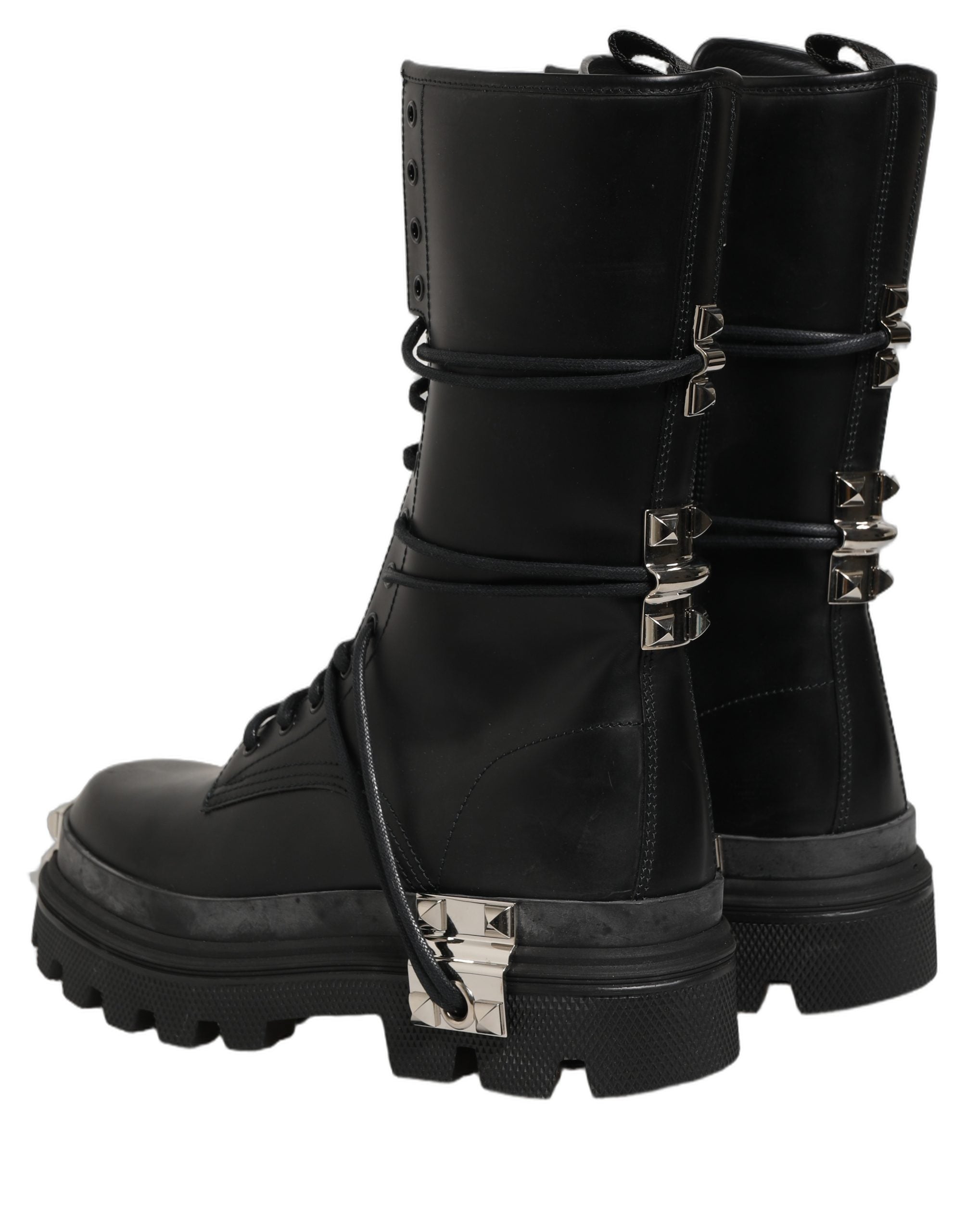 Bottes noires Dolce & Gabbana en cuir avec semelle plateforme à clous et style combat, pour un look audacieux.