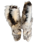 Bottes hautes en fausse fourrure multicolore de Dolce & Gabbana, style élégant et tendance, pour un look chic et sophistiqué.