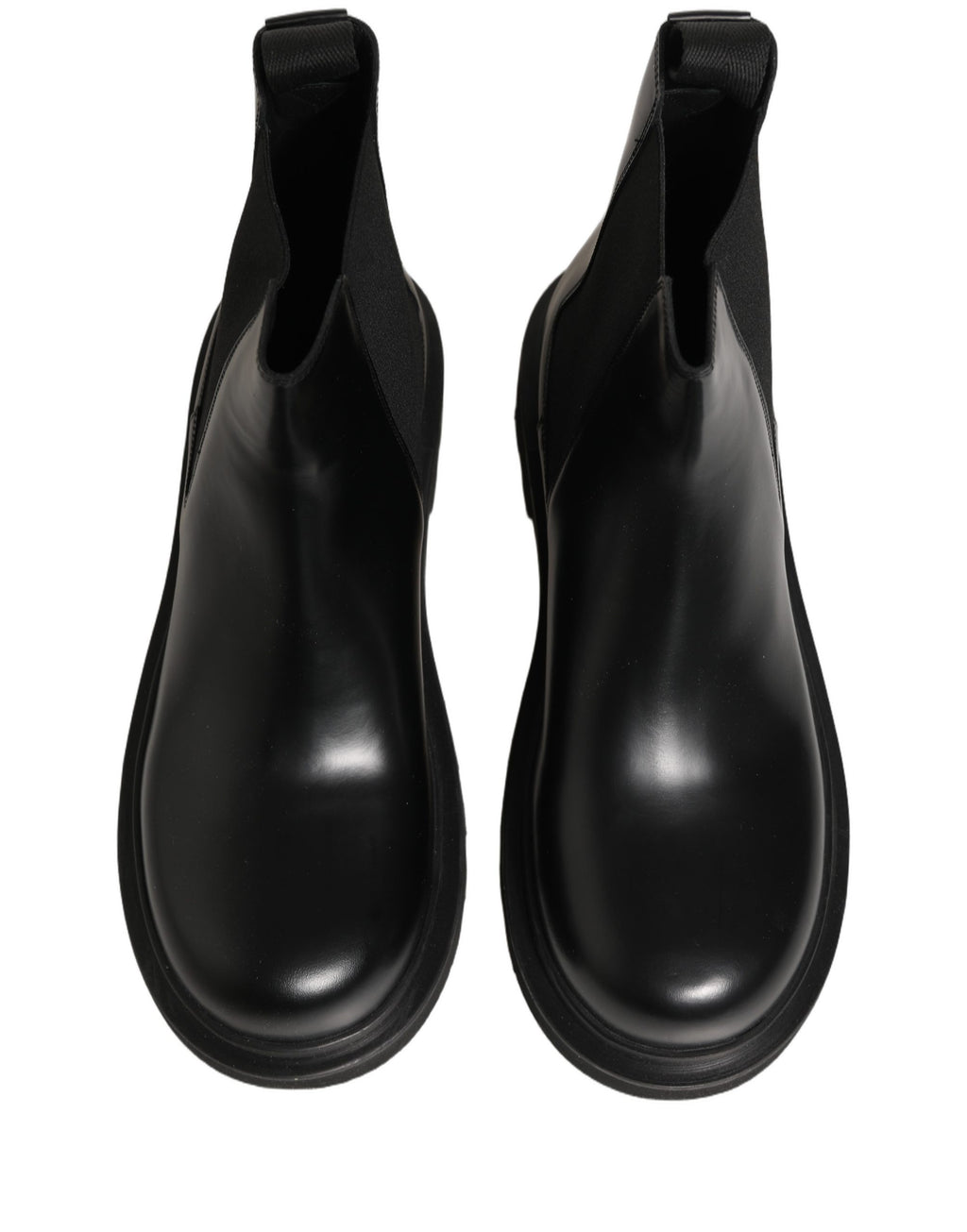Chaussures homme Dolce & Gabbana Chelsea boots en cuir noir, slip-on, style élégant et moderne.