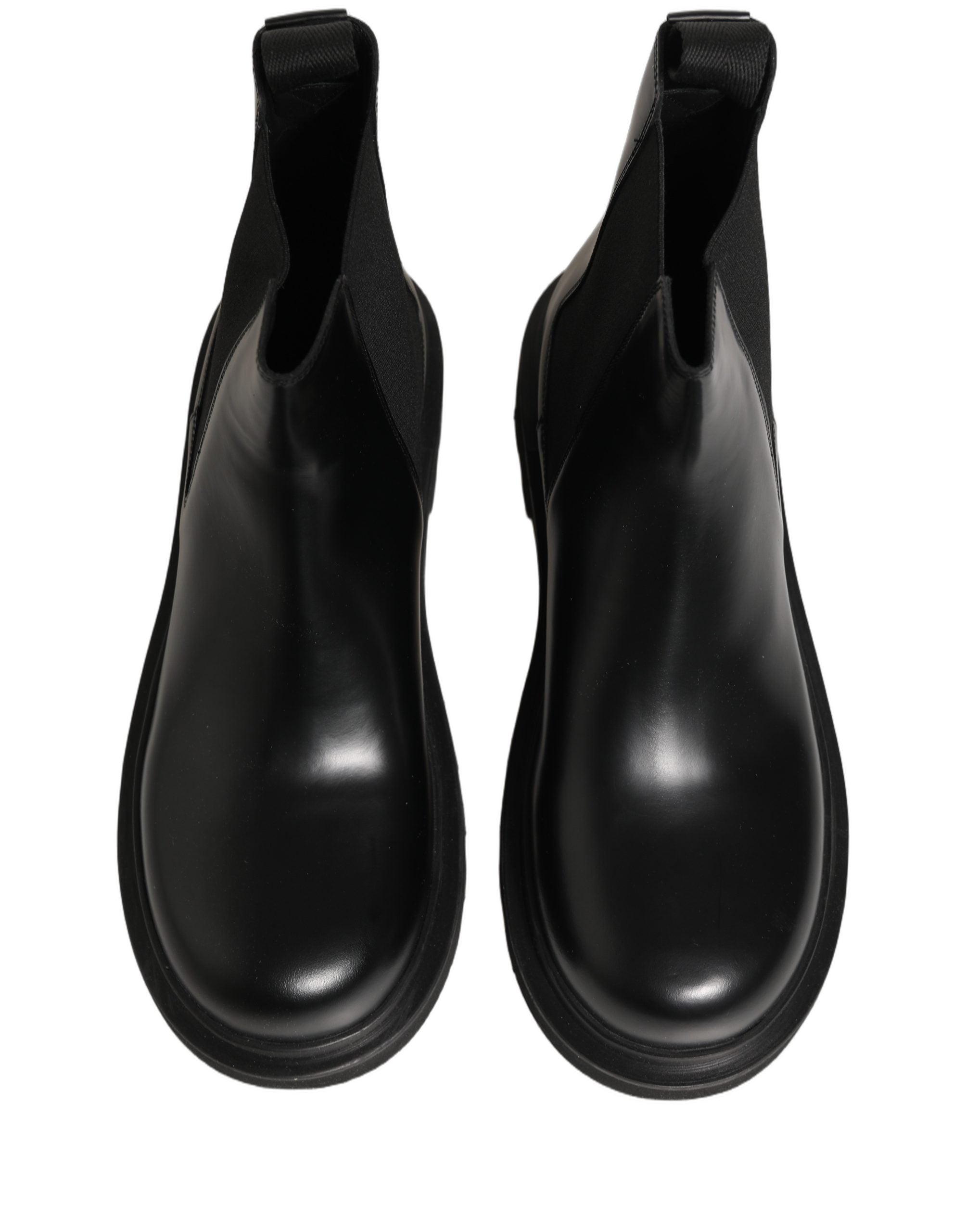 Chaussures homme Dolce & Gabbana Chelsea boots en cuir noir, slip-on, style élégant et moderne.