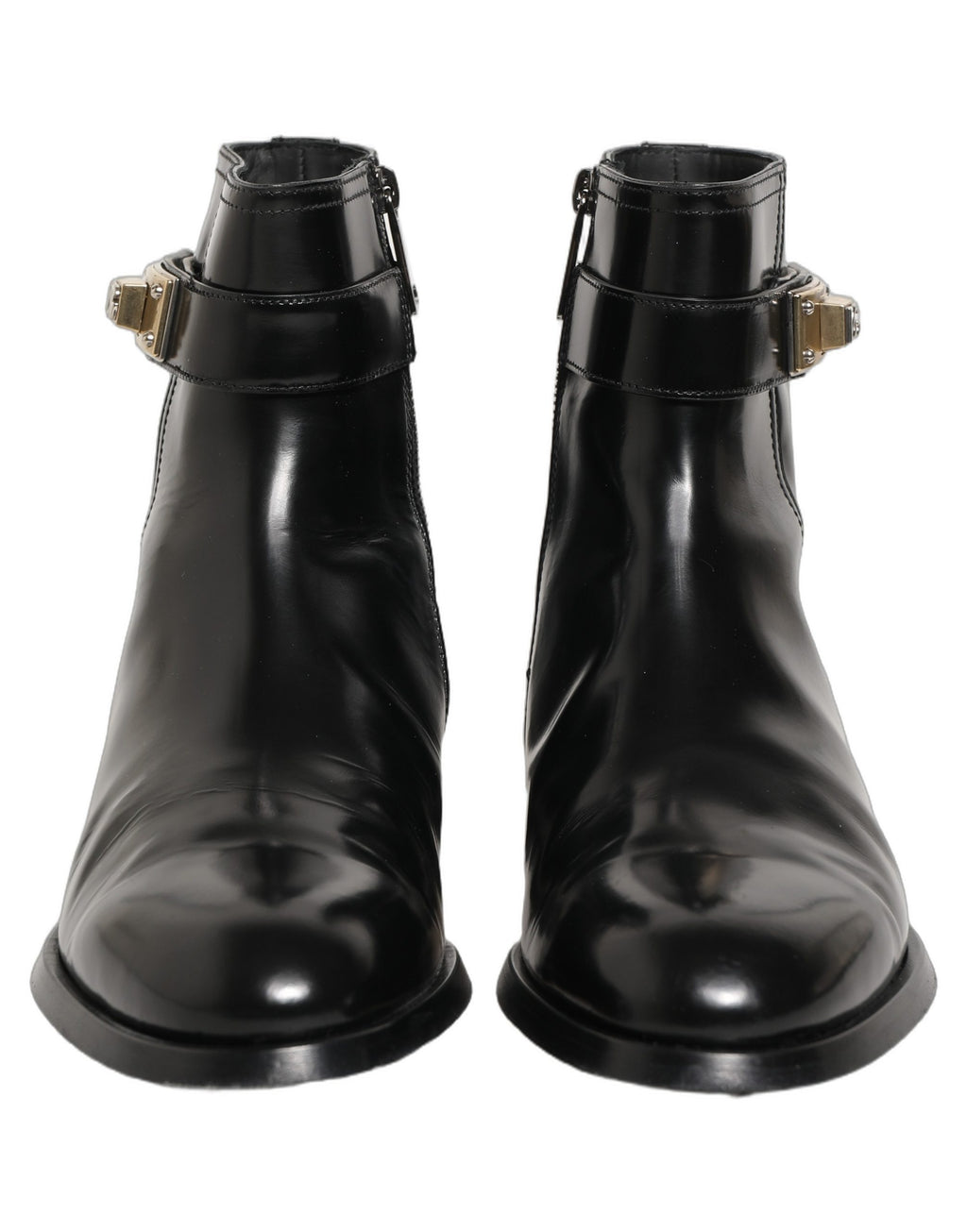 Bottes mi-mollet en cuir noir Dolce & Gabbana avec boucle logo, style élégant et tendance, vue de face sur fond neutre.