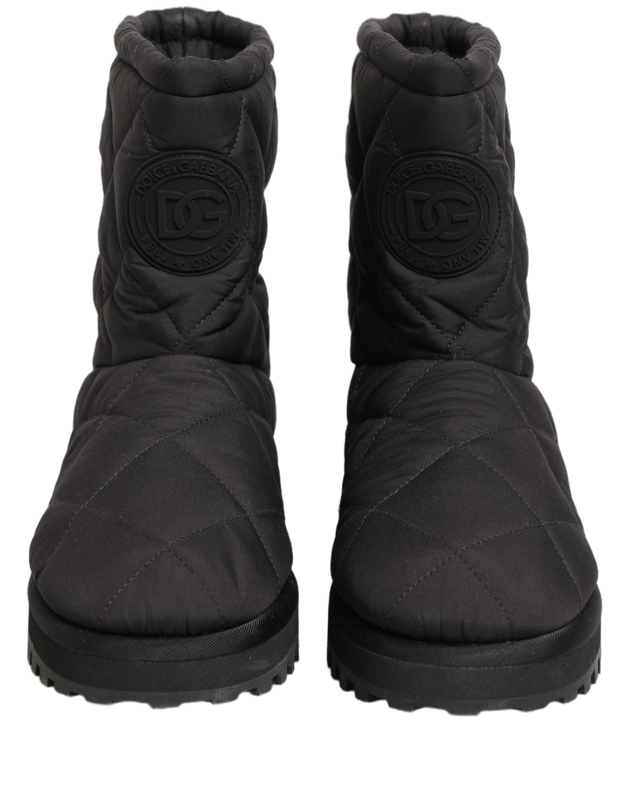 Bottes mi-mollet noires en effet matelassé de Dolce & Gabbana, chaussures élégantes en cuir pour femme