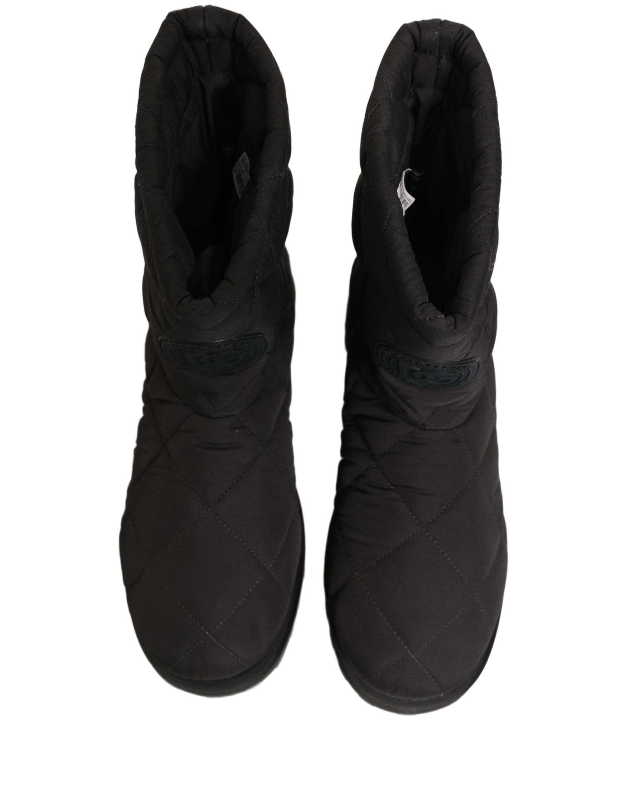 Bottes mi-mollet noires en effet matelassé de Dolce & Gabbana, chaussures élégantes et sophistiquées pour femmes.