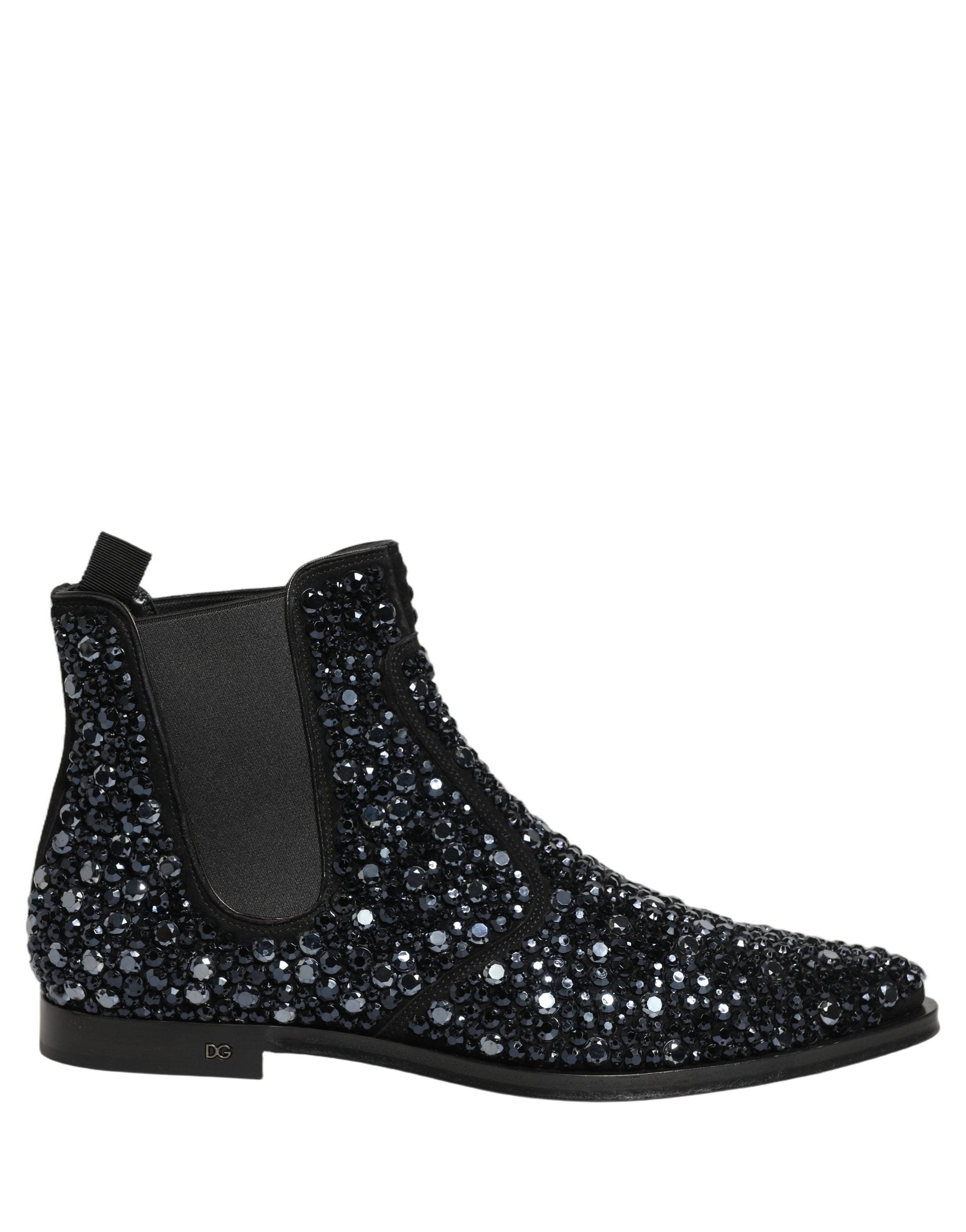 Bottes Chelsea noires Dolce & Gabbana avec embellissements, semelle en cuir et détails élégants pour un style sophistiqué.