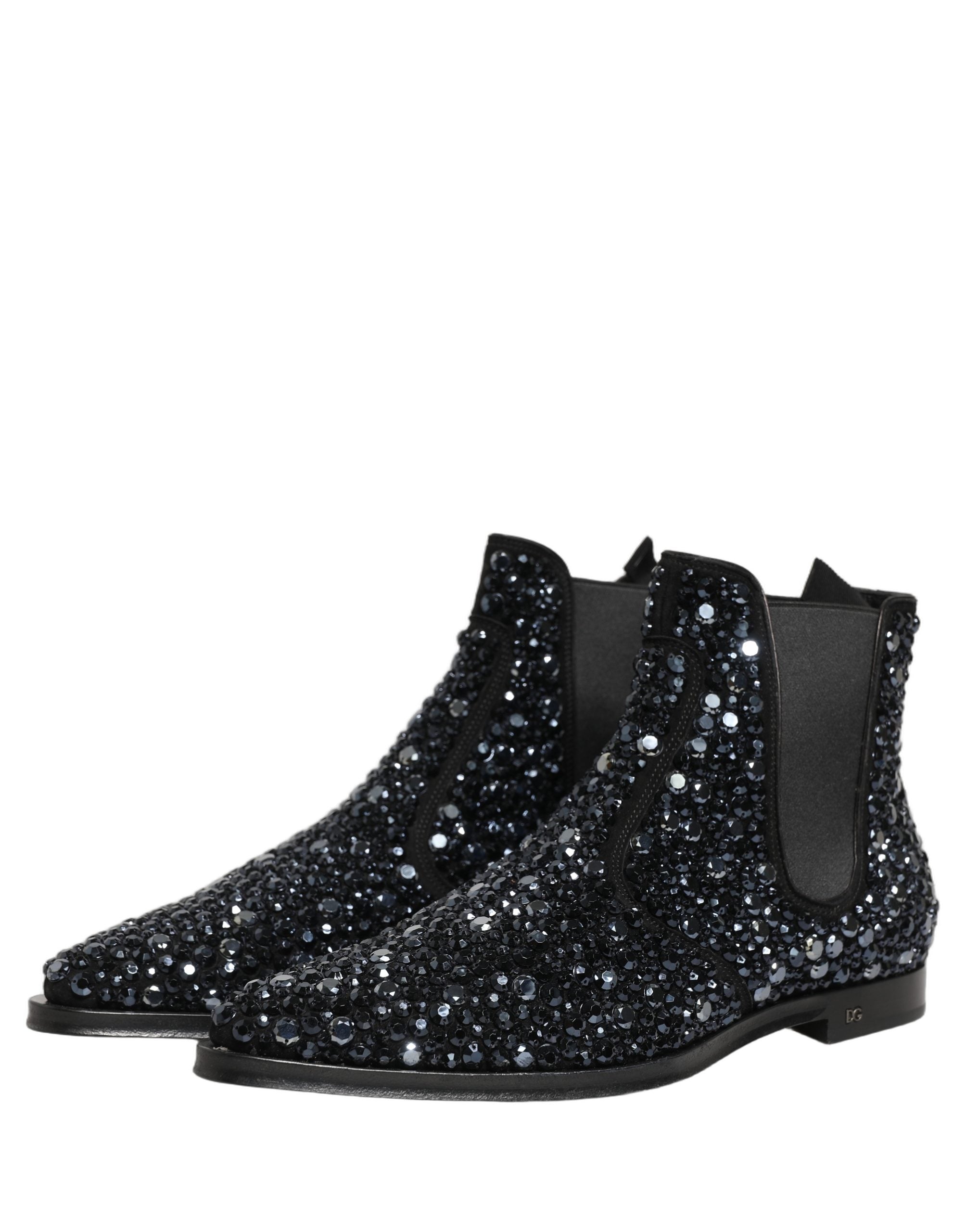 Bottines Chelsea noires Dolce & Gabbana avec embellissements, semelle en cuir et design élégant visible sur la chaussure.