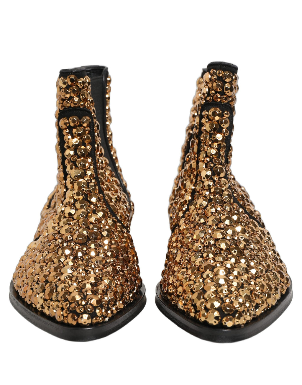 Bottes Chelsea dorées Dolce & Gabbana avec embellissements, ankle boots élégantes en cuir avec détails métalliques.