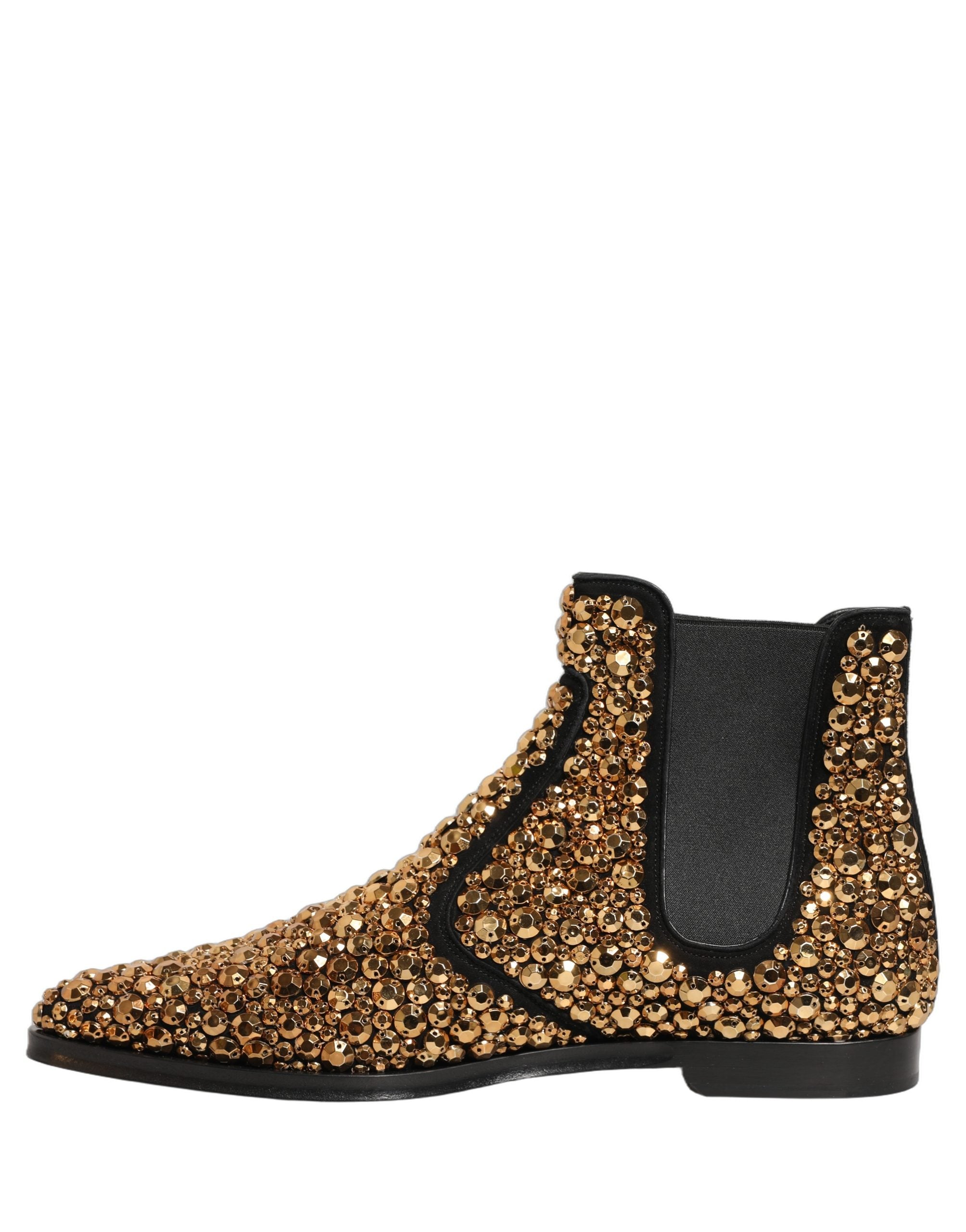 Bottines Chelsea dorées Dolce & Gabbana avec embellissements dorés et semelle en cuir, vue de face.