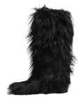 Bottes d'hiver mi-mollet en fausse fourrure noire de Dolce & Gabbana, chaussures élégantes pour le froid.