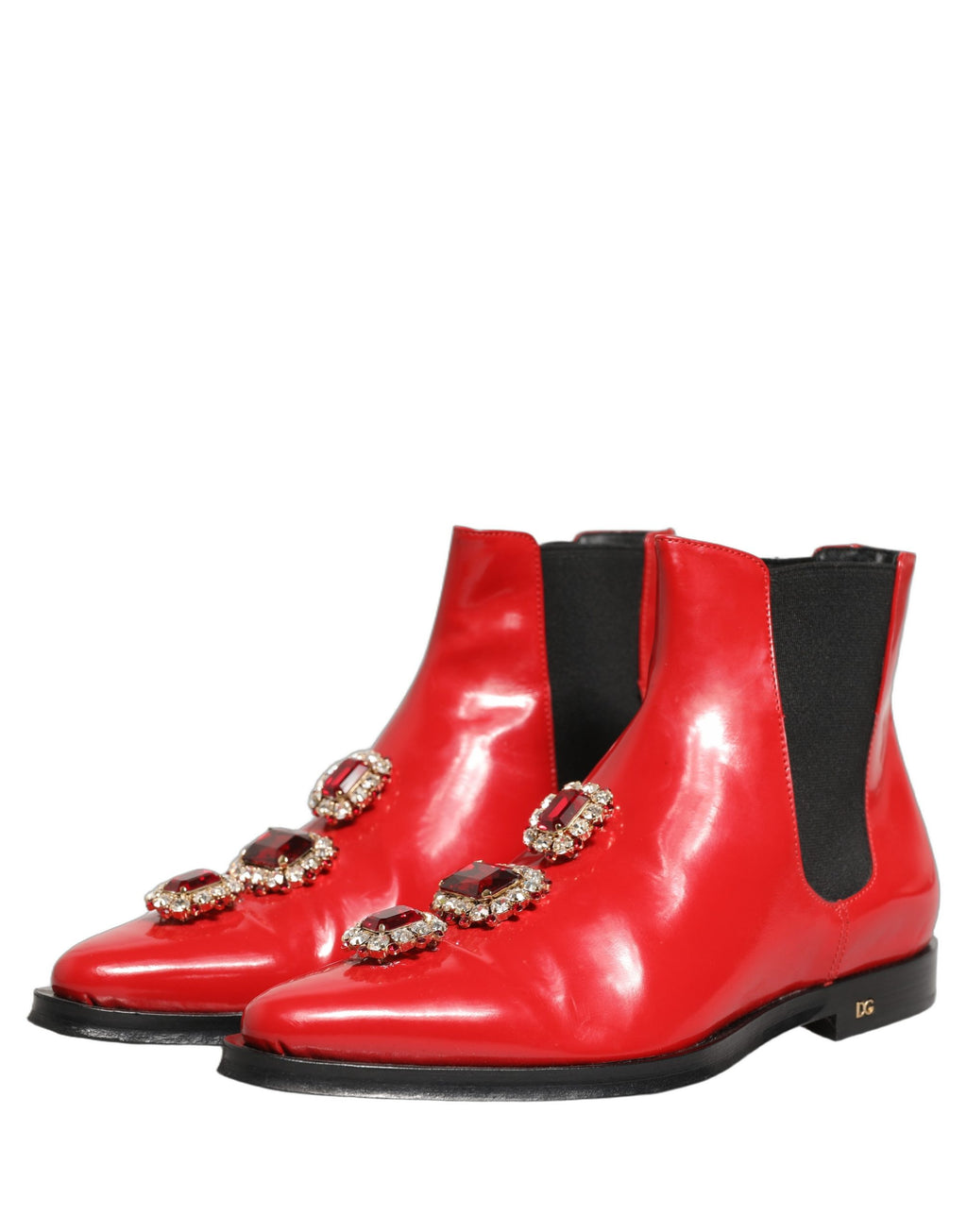 Bottes Chelsea pour homme Dolce & Gabbana rouges avec ornements, semelle en cuir et design élégant.