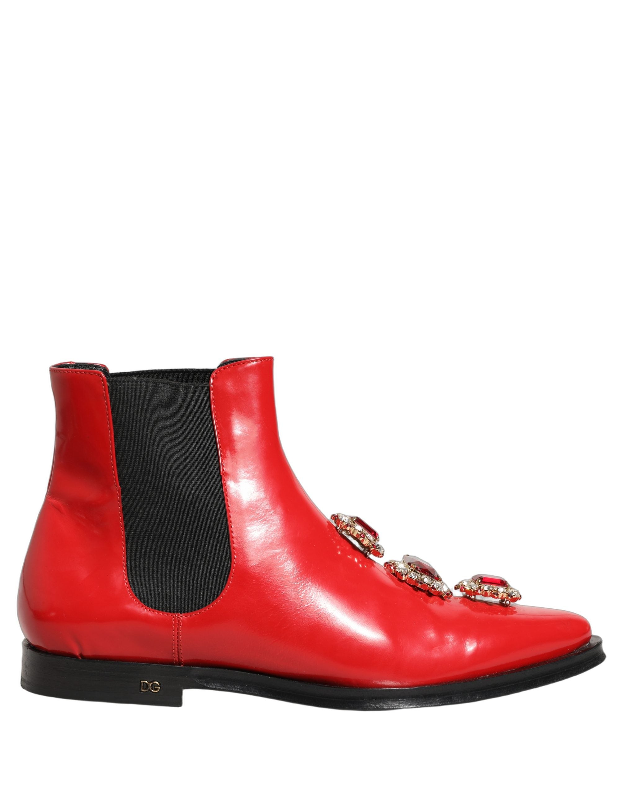 Bottes Chelsea pour homme Dolce & Gabbana rouges ornées de strass, chaussures élégantes et sophistiquées.