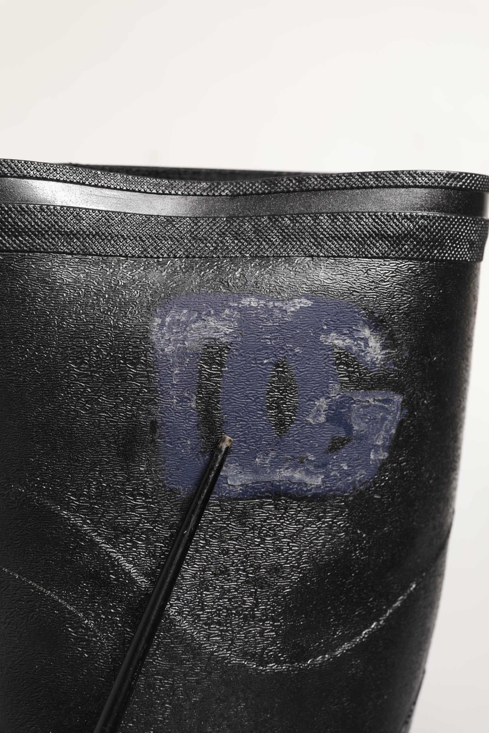 Bottes de pluie noires en PVC de Dolce & Gabbana pour homme, chaussures à enfiler élégantes et imperméables.