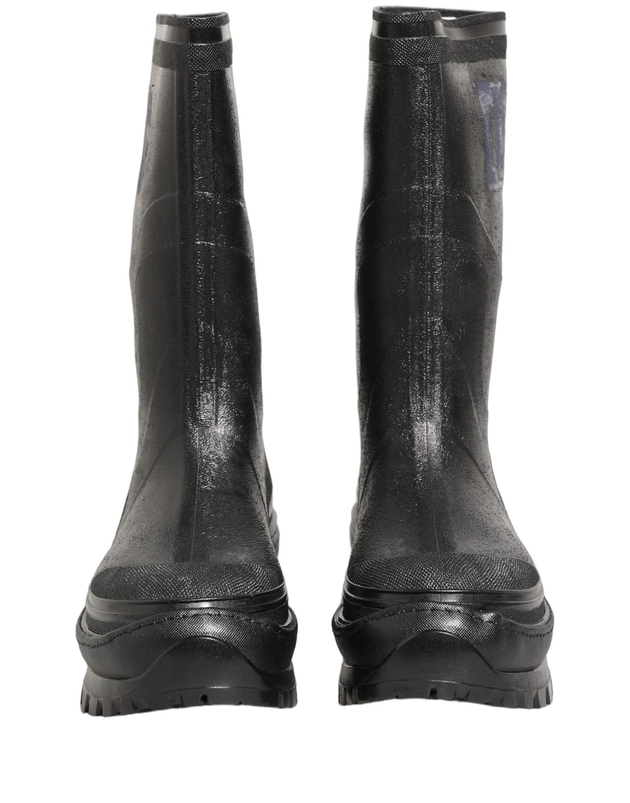 Bottes de pluie noires en PVC pour hommes de la marque Dolce & Gabbana, faciles à enfiler, avec une finition élégante.
