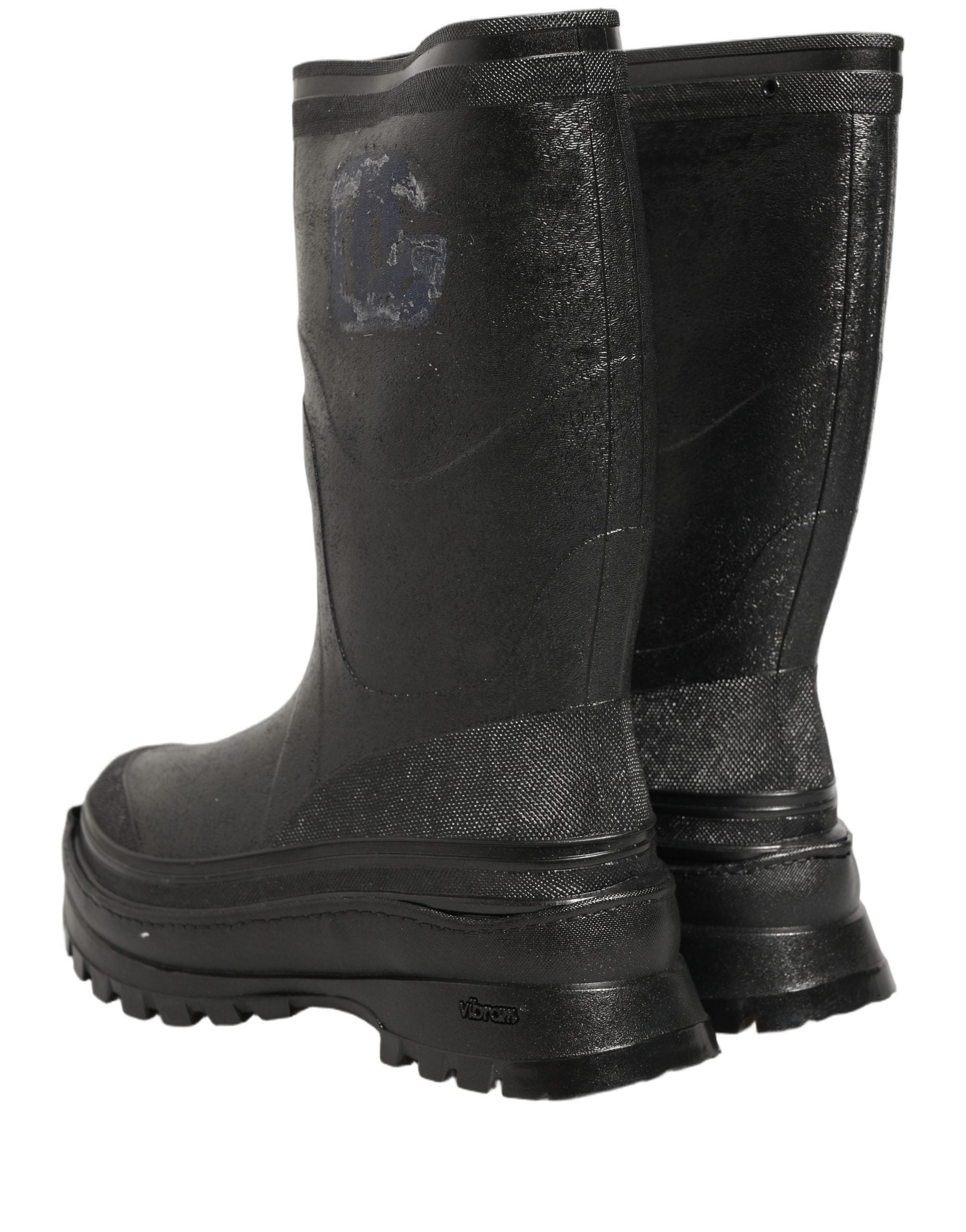Bottes de pluie noires en PVC pour homme de la marque Dolce & Gabbana, faciles à enfiler, avec une finition brillante.