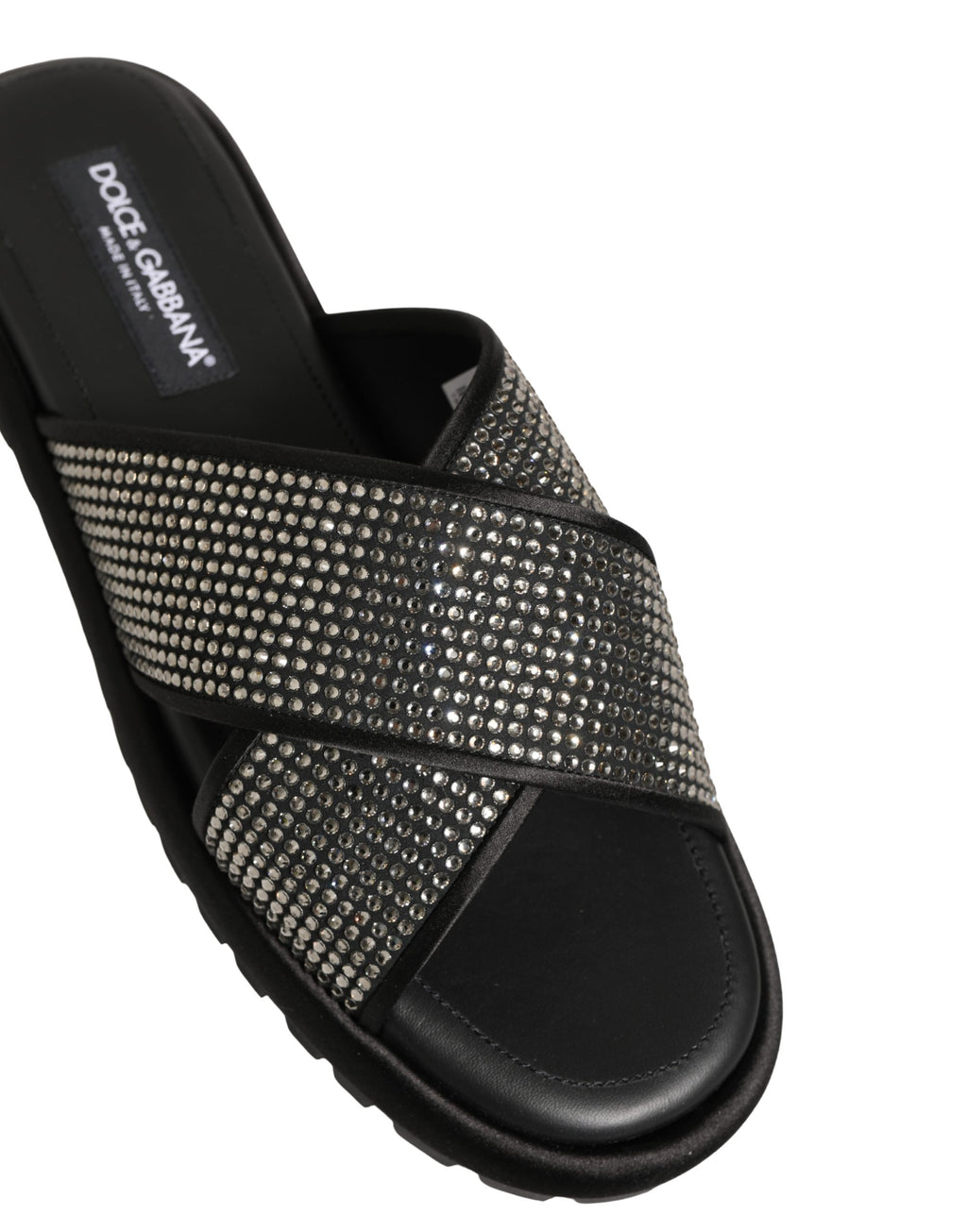 Sandales plates noires Dolce & Gabbana avec strass et design croisillé, semelle confortable et style élégant.