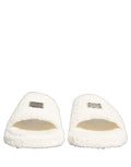 Sandales homme Dolce & Gabbana en fausse fourrure blanche, chaussons décontractés en style slip-on.