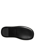 Sandales pour hommes Dolce & Gabbana noires à plateforme avec cristaux ornés, design élégant et sophistiqué.
