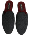 Sandales Dolce & Gabbana en brocart floral noir, chaussons élégants avec design floral sophistiqué.