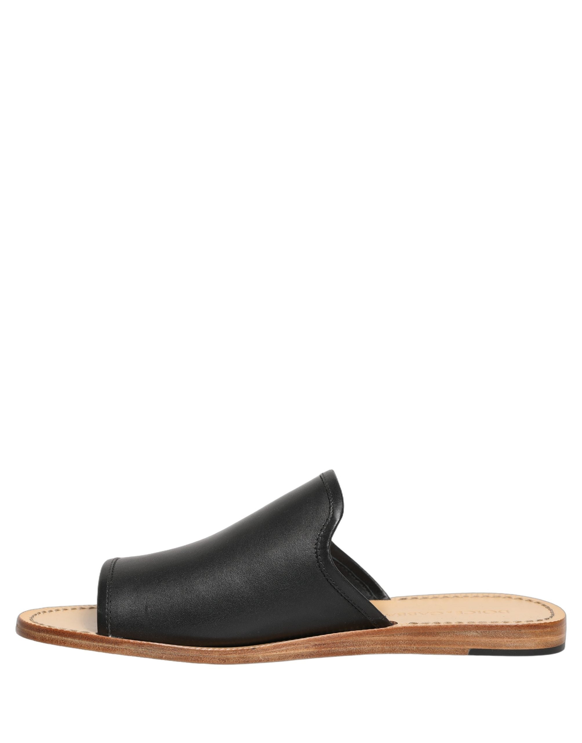 Sandales plates en cuir marron Dolce & Gabbana pour hommes, chaussures élégantes et confortables.