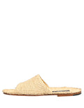 Sandales plates Dolce & Gabbana en raphia beige avec bride en paille, chaussures d'été élégantes et confortables.