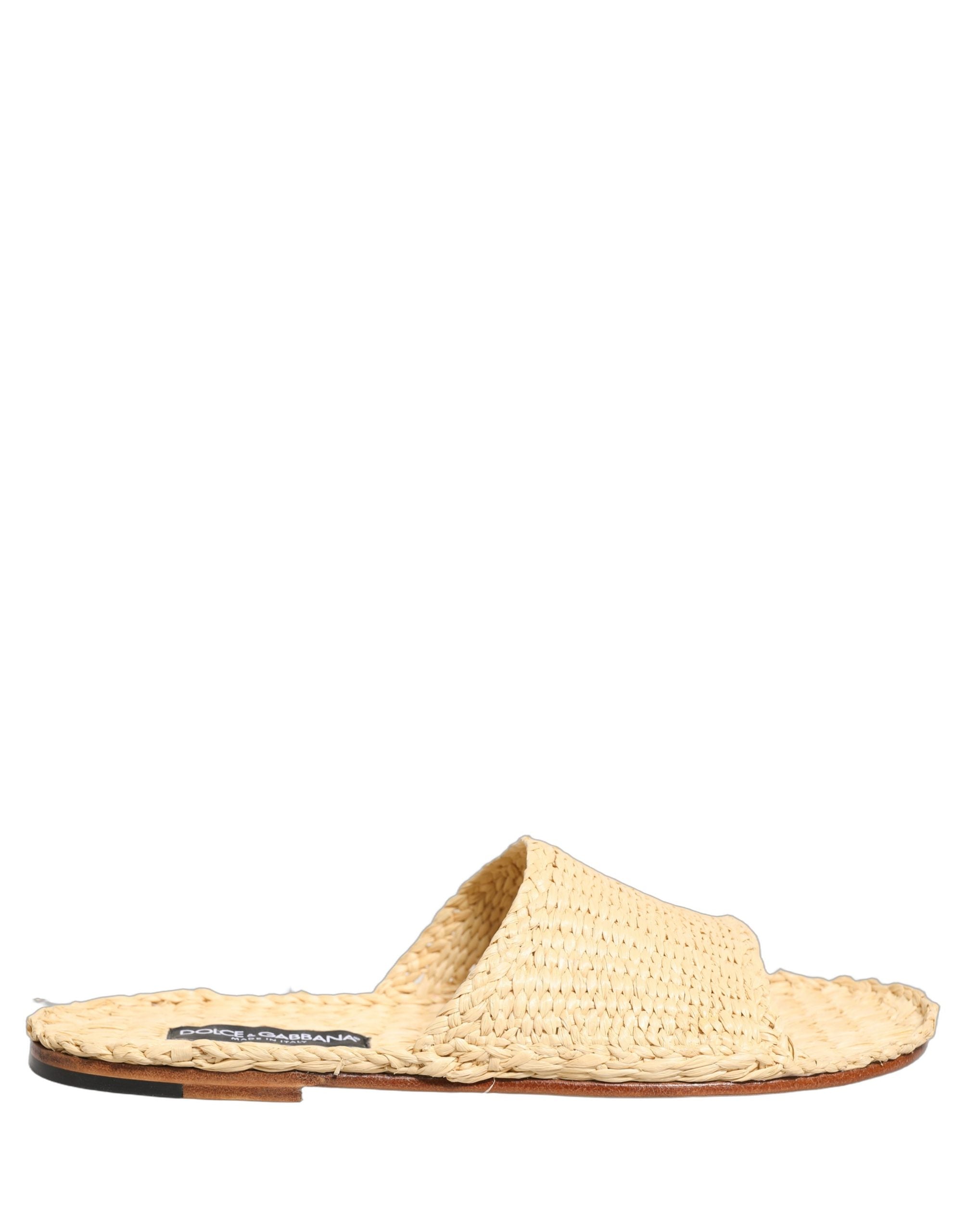 Sandales plates Dolce & Gabbana en paille beige avec bride en raphia, chaussures d'été élégantes et confortables.