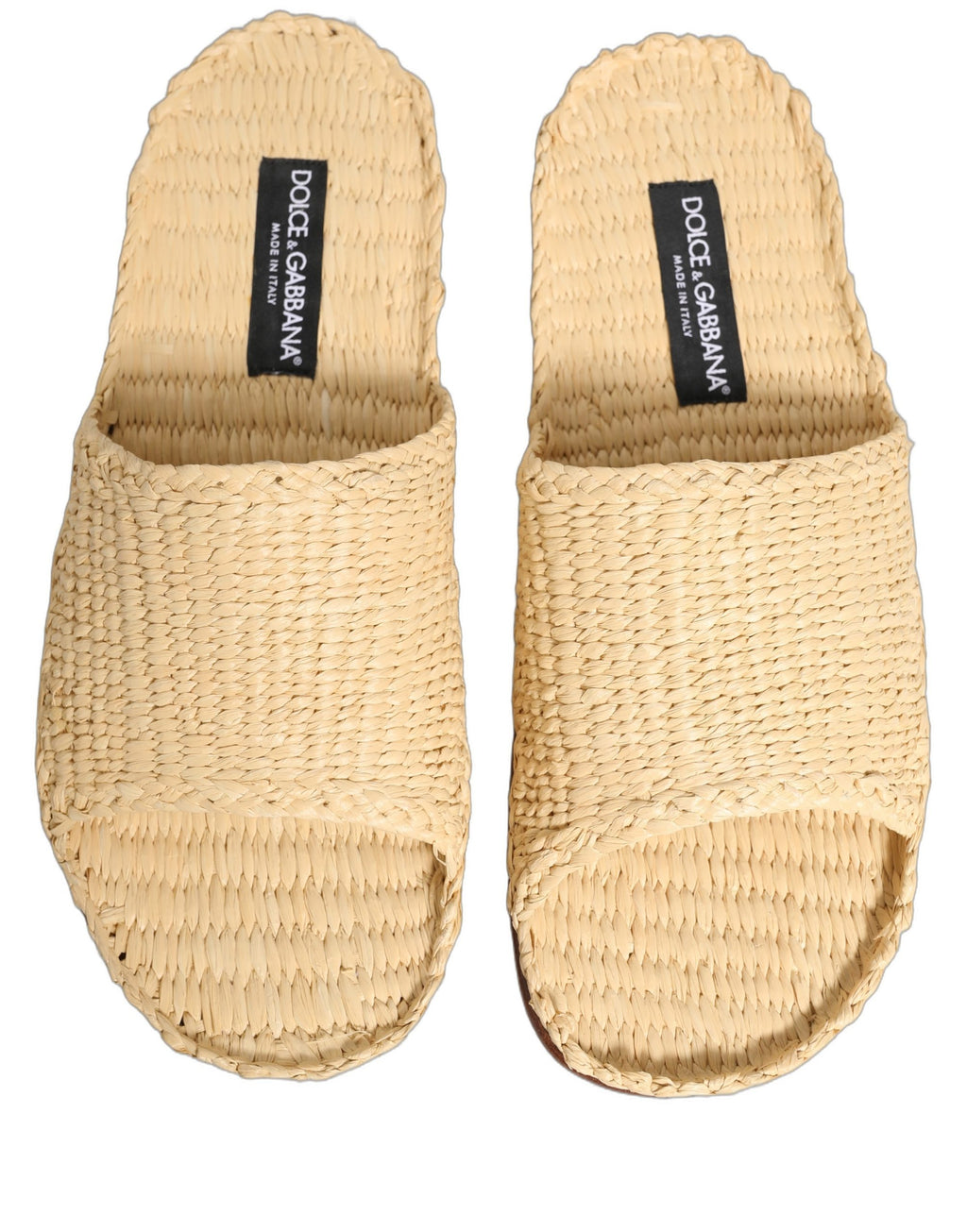 Sandales plates Dolce & Gabbana en paille beige, chaussures confortables et élégantes avec bride en raffia naturel.