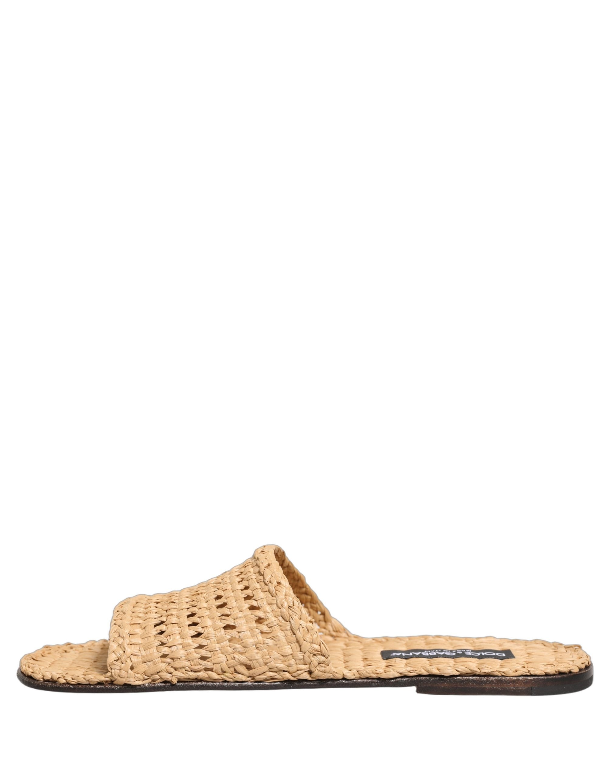 Sandales plates Dolce & Gabbana en paille beige, chaussures élégantes en raphia pour un style décontracté et sophistiqué.