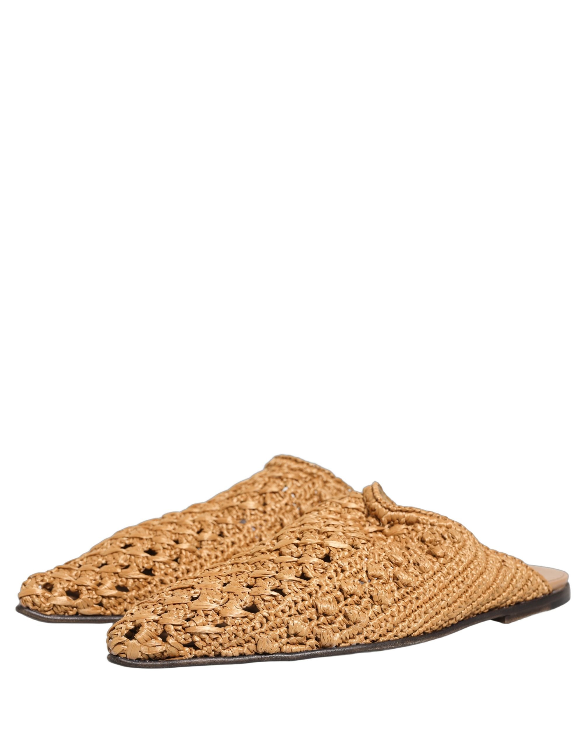 Sandales plates Dolce & Gabbana en paille tissée beige, chaussures décontractées et élégantes pour l'été.
