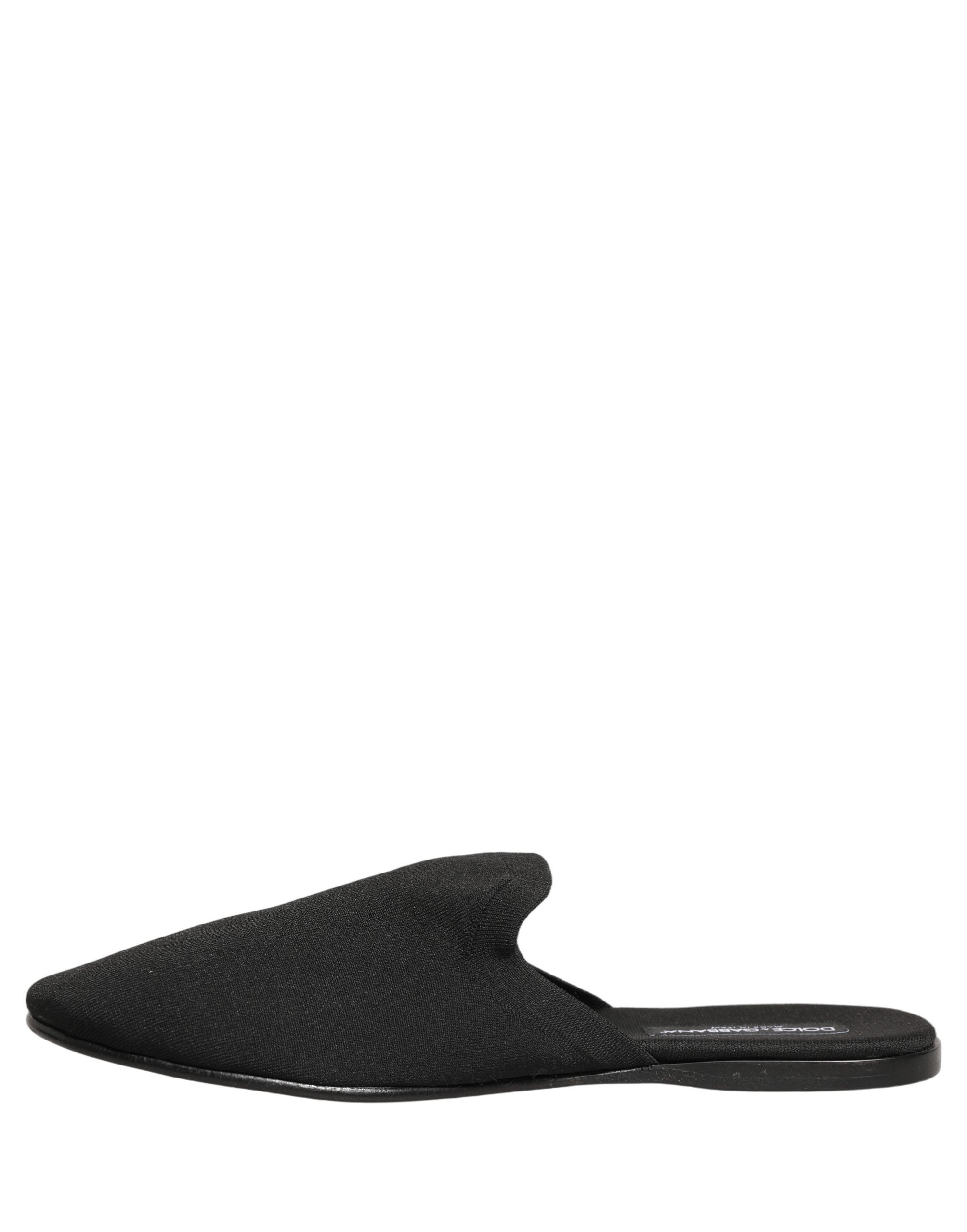 Chaussures homme Dolce & Gabbana en daim noir, slippers plates élégantes pour homme, vue de profil.