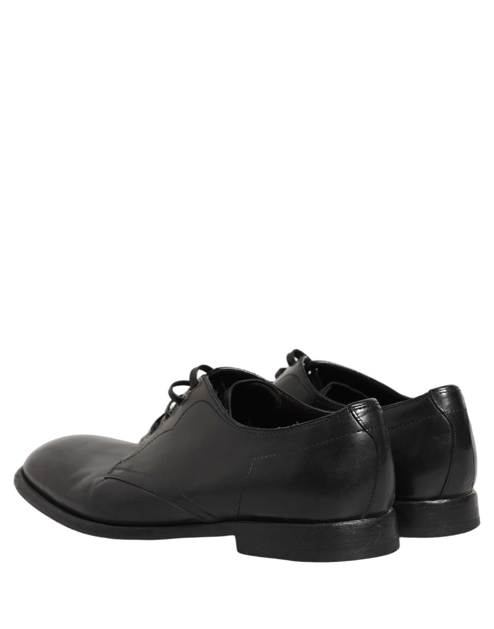 Chaussures Derby habillées en cuir noir de Dolce & Gabbana pour homme, chaussures formelles élégantes et sophistiquées.
