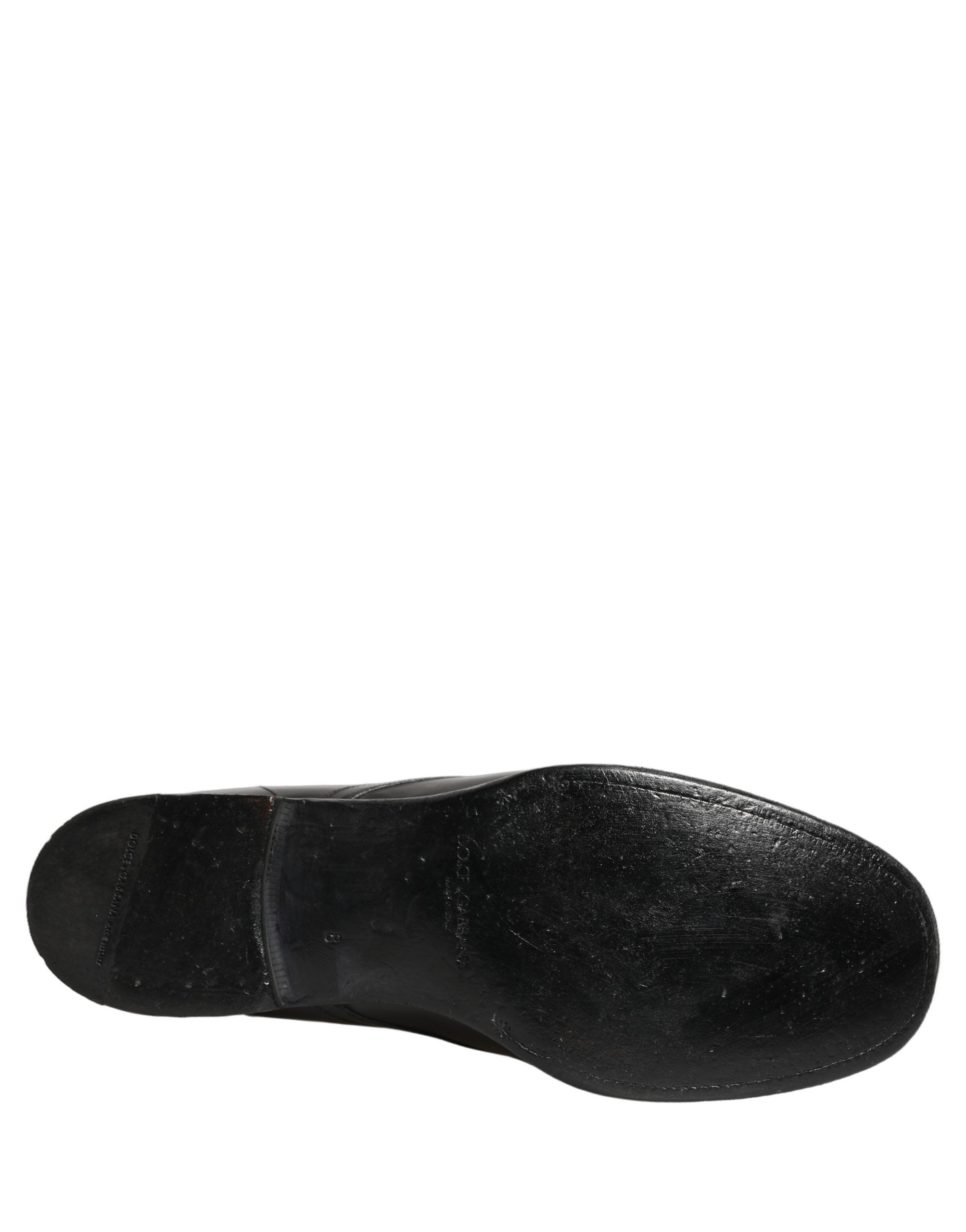 Chaussures Derby en cuir noir de Dolce & Gabbana pour homme, chaussures formelles élégantes et sophistiquées.