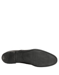 Chaussures Derby en cuir noir Dolce & Gabbana pour homme, chaussures formelles élégantes et sophistiquées.