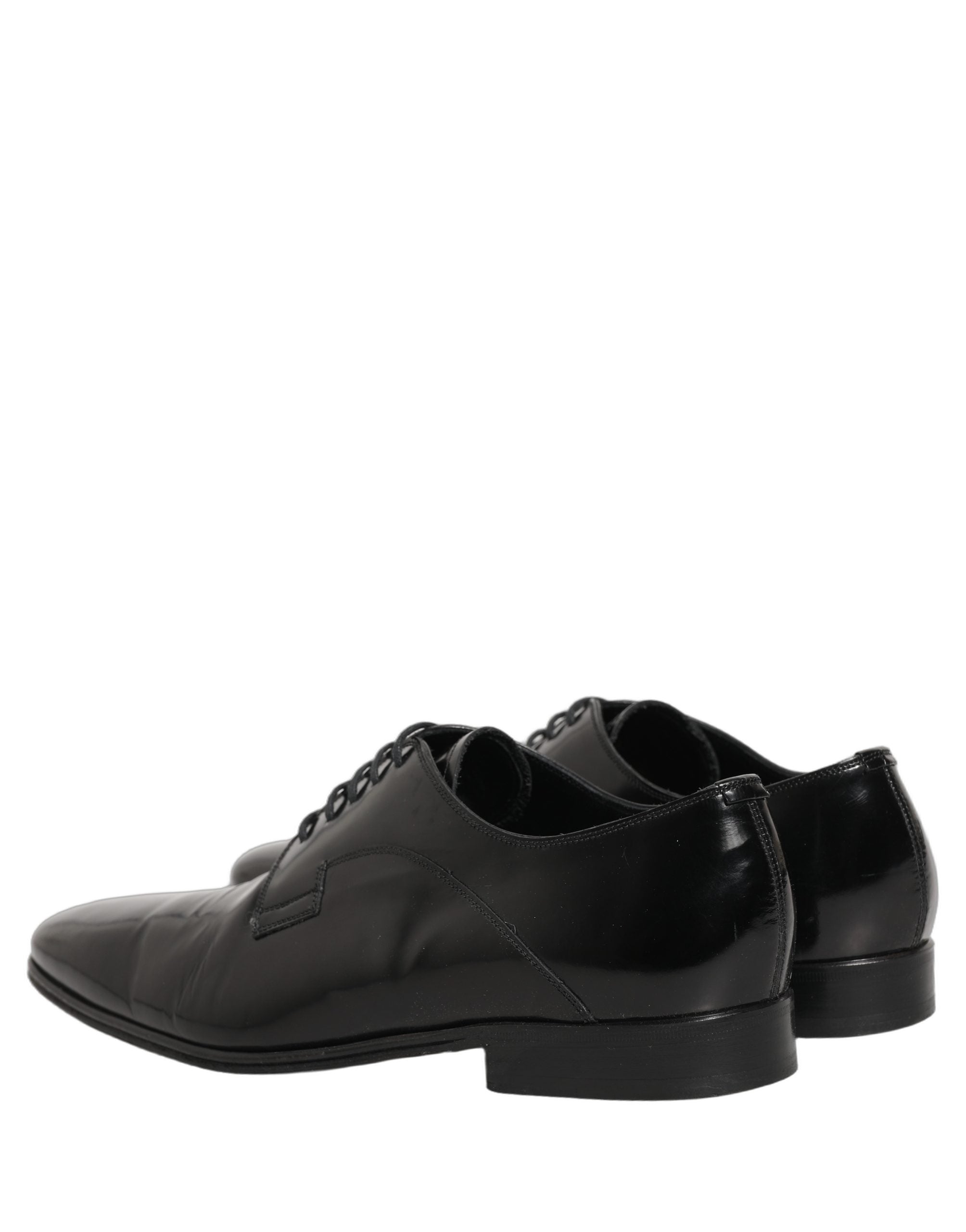 Chaussures derby en cuir noir pour homme de la marque Dolce & Gabbana, chaussures formelles élégantes et sophistiquées.