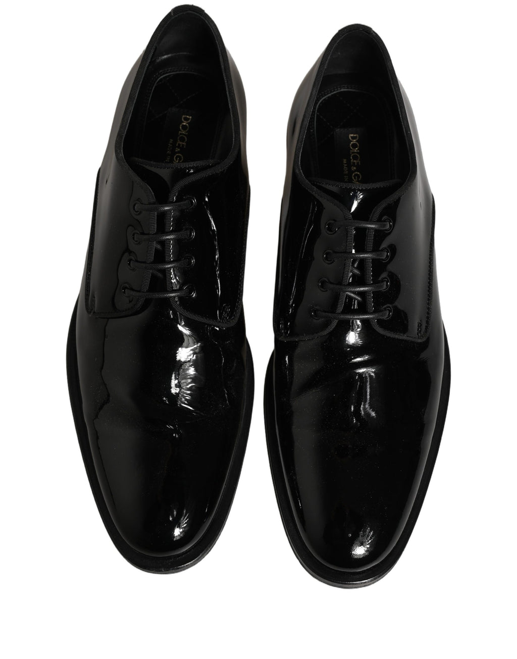 Chaussures formelles Derby en cuir noir de la marque Dolce & Gabbana pour homme, vue de face sur fond blanc