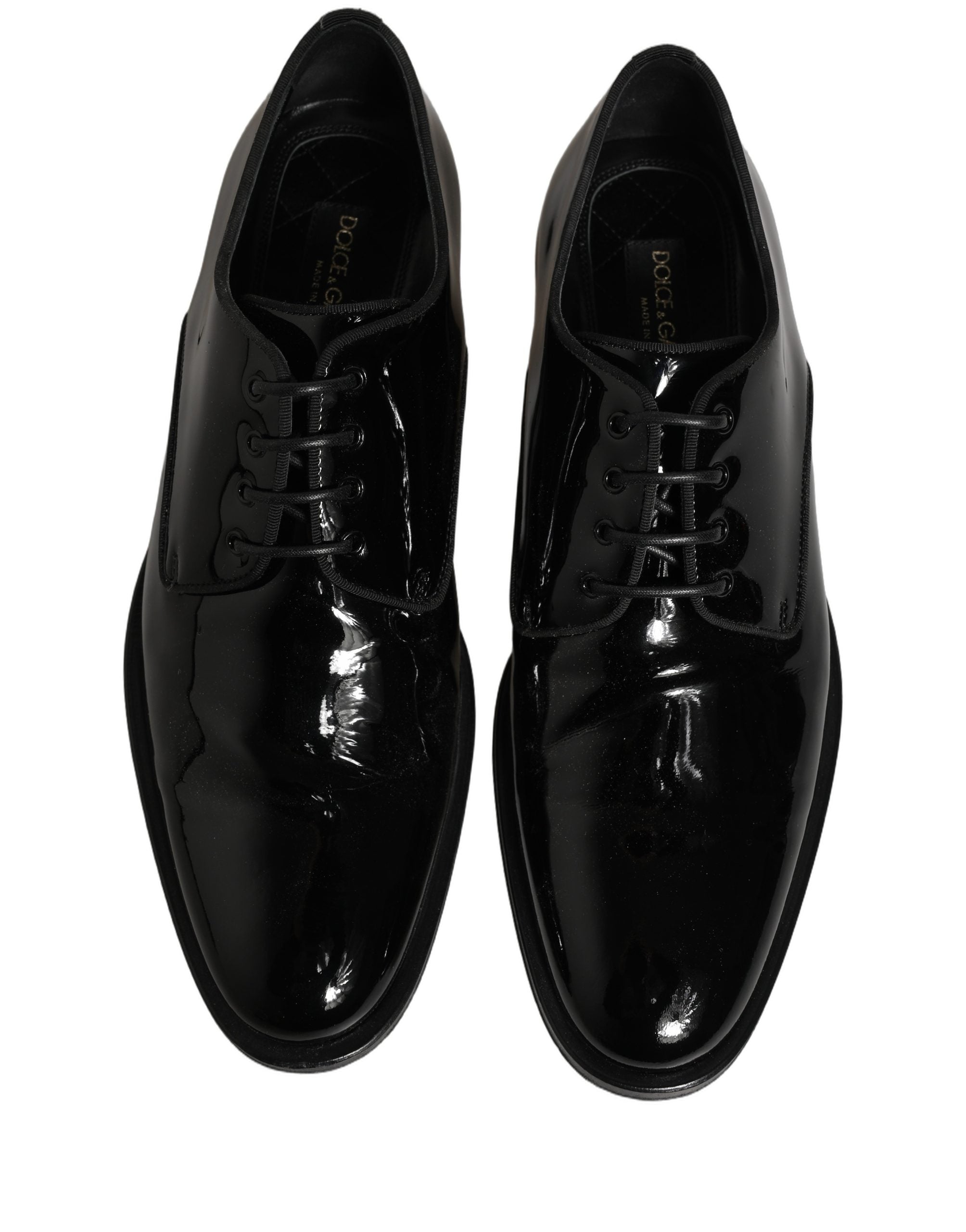 Chaussures formelles Derby en cuir noir de la marque Dolce & Gabbana pour homme, vue de face sur fond blanc