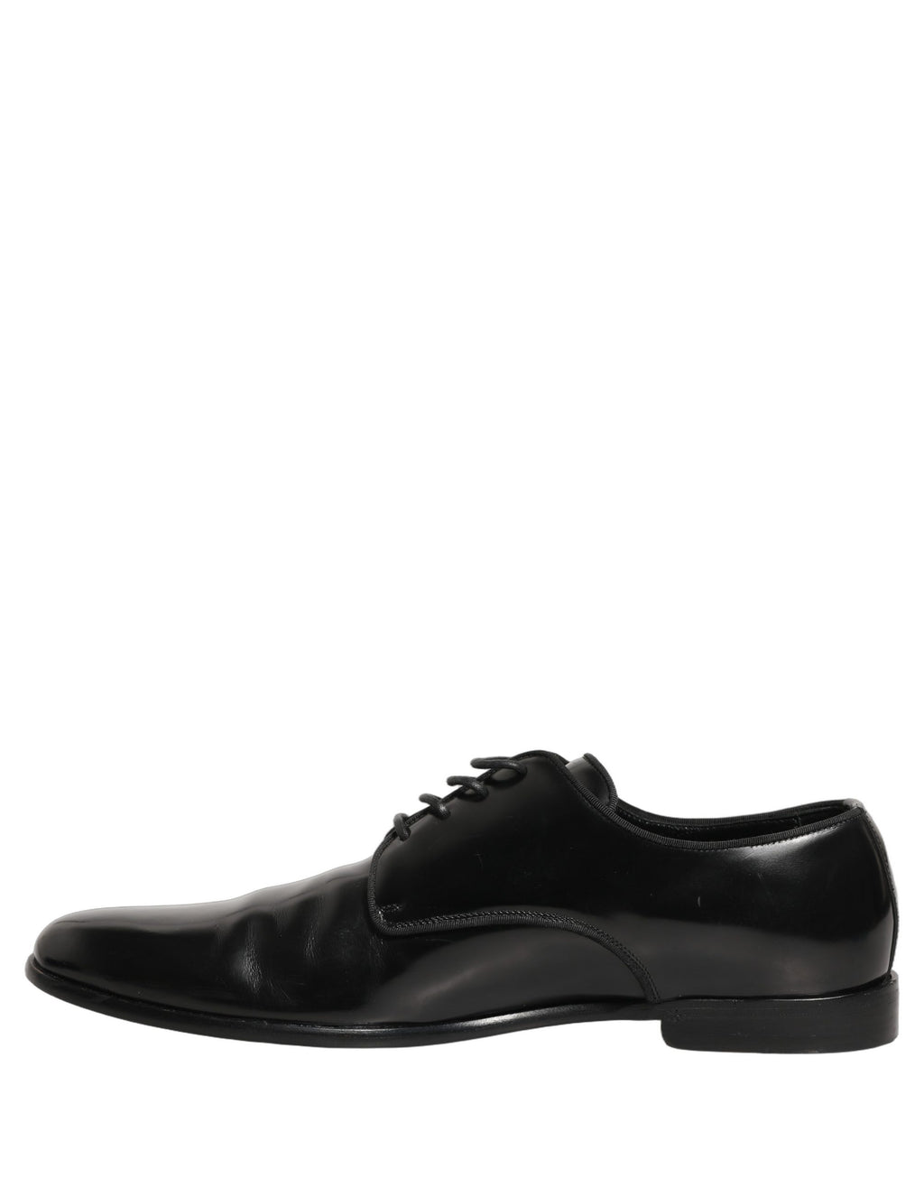 Chaussures derby formelles en cuir noir pour homme de Dolce & Gabbana, élégantes et sophistiquées, visibles en gros plan.