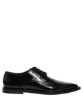 Chaussures derby formelles en cuir noir de la marque Dolce & Gabbana pour homme, élégantes et sophistiquées.
