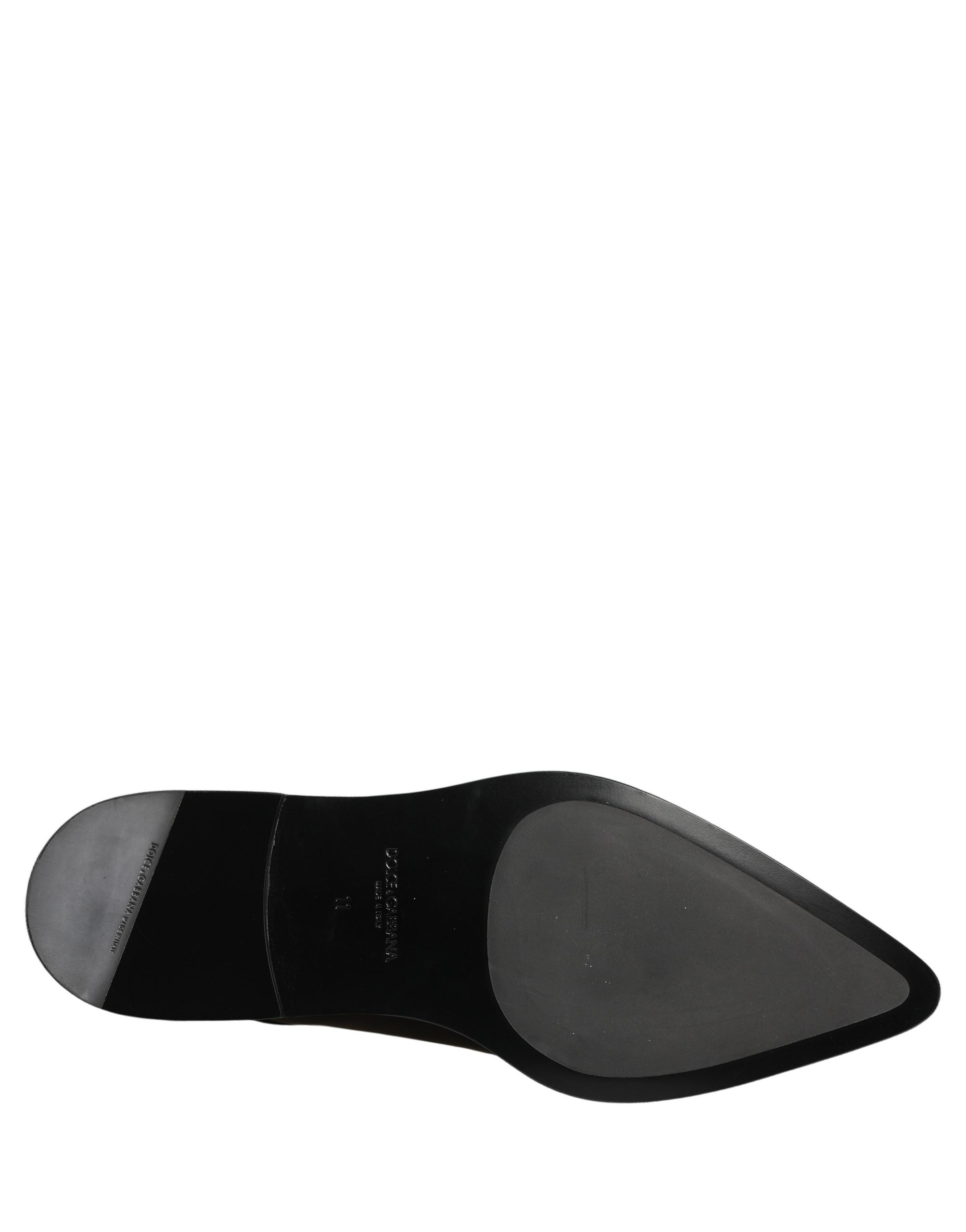Chaussures derby noires en cuir pour homme de Dolce & Gabbana, chaussures formelles élégantes et sophistiquées.