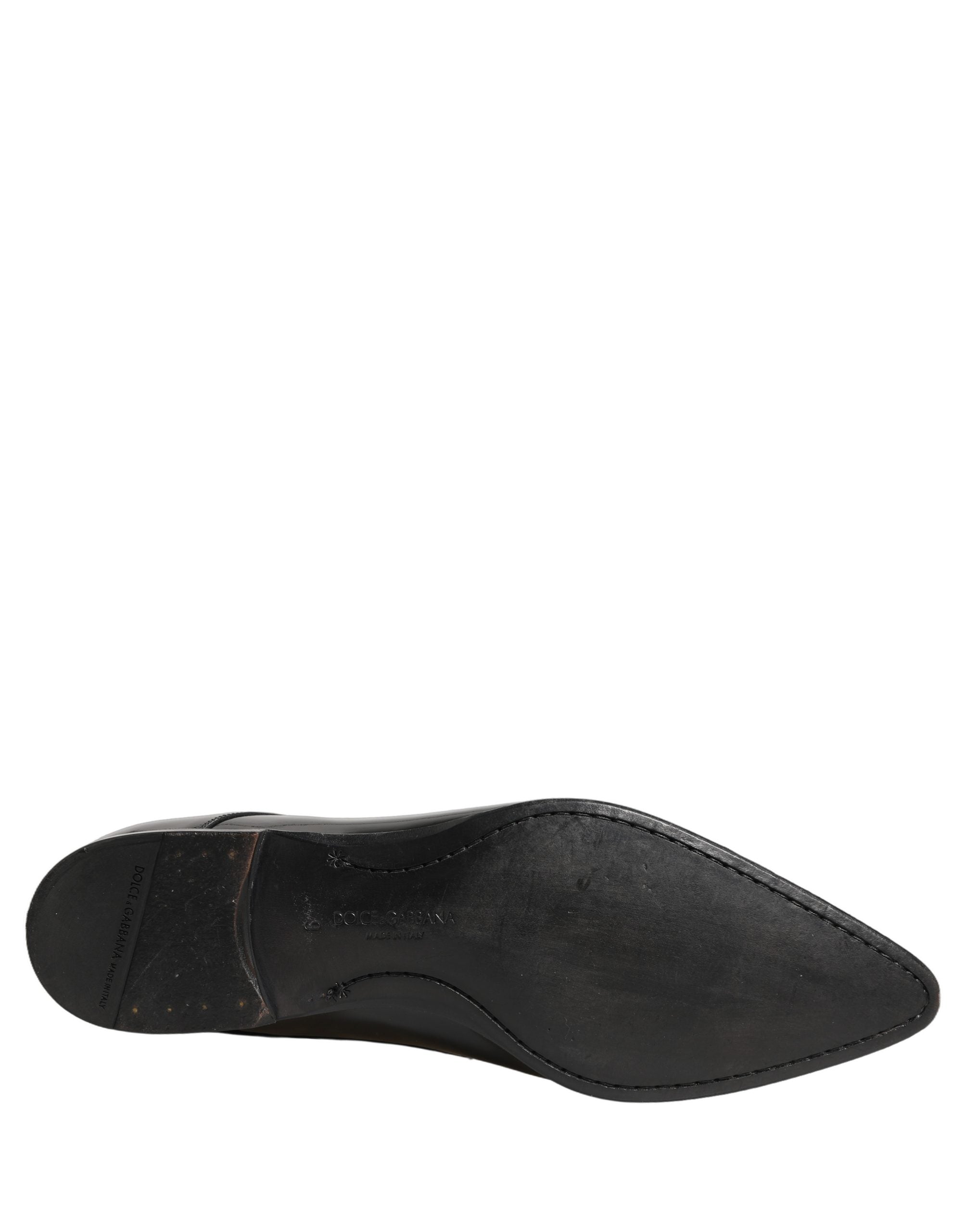 Chaussures derby en cuir noir pour homme de la marque Dolce & Gabbana, chaussures formelles élégantes et sophistiquées.