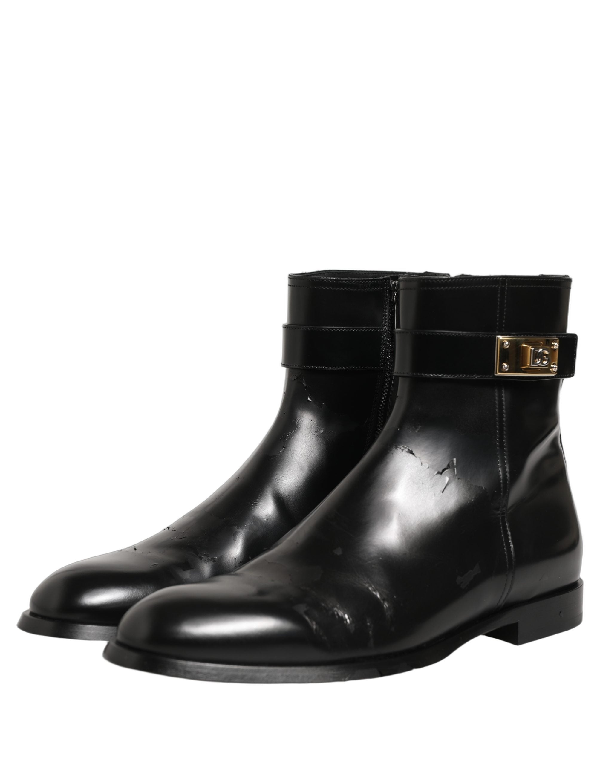 Bottes en cuir noir Dolce & Gabbana avec boucle logo, mi-mollet, chaussures élégantes et sophistiquées.