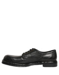 Chaussures hommes Derby en cuir noir Dolce & Gabbana avec laçage, style élégant et sophistiqué.