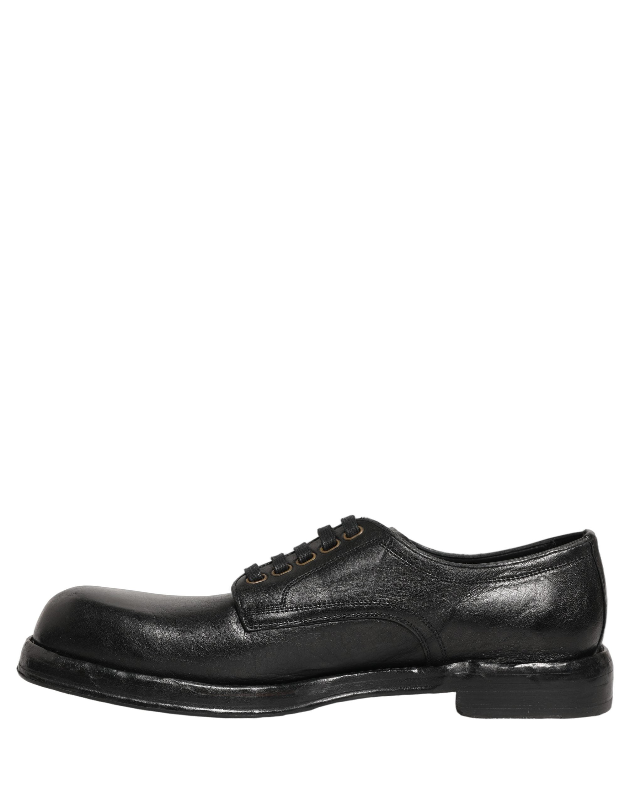 Chaussures hommes Derby en cuir noir Dolce & Gabbana avec laçage, style élégant et sophistiqué.