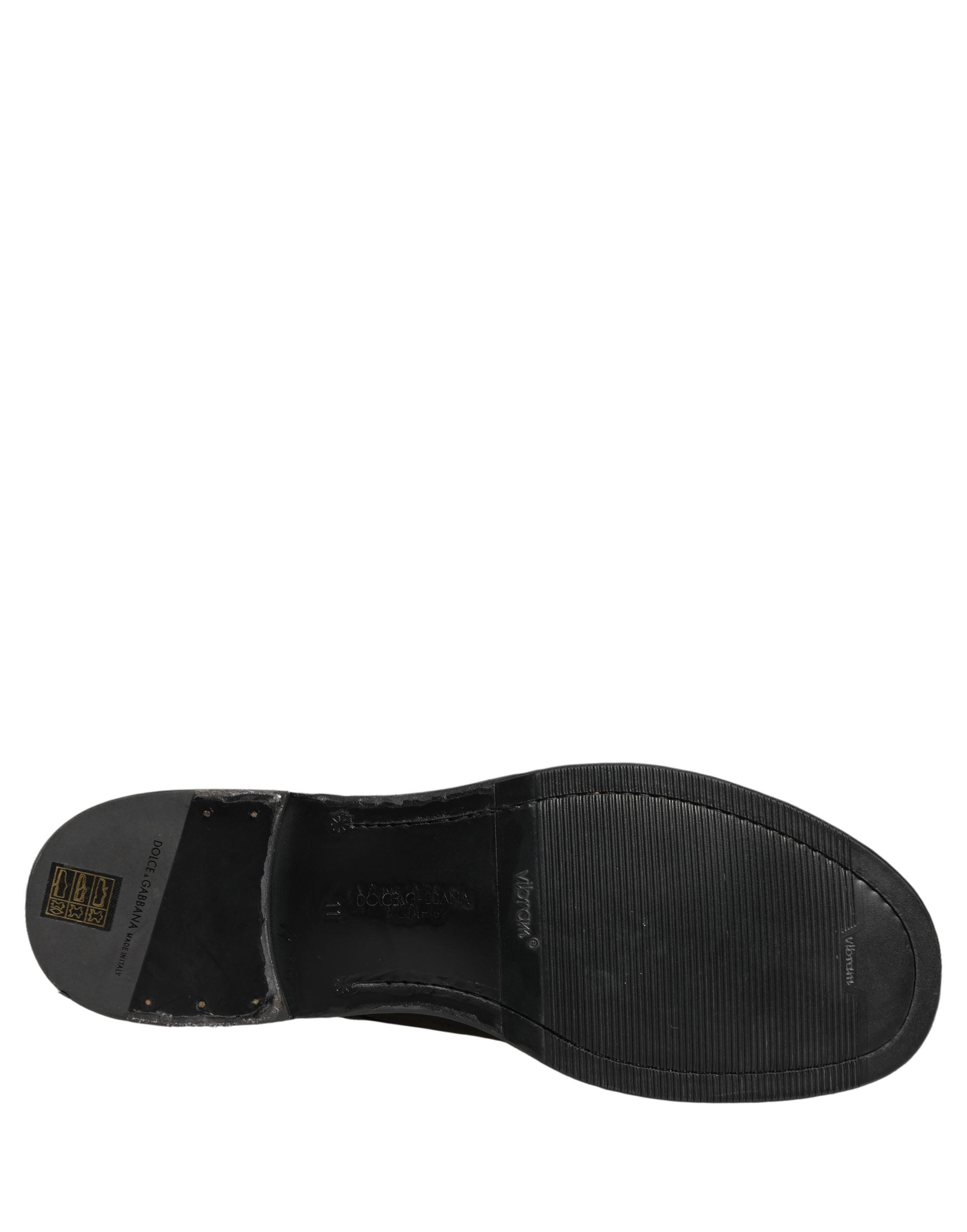 Chaussures Derby pour homme Dolce & Gabbana en cuir noir avec lacets, style élégant et classique.