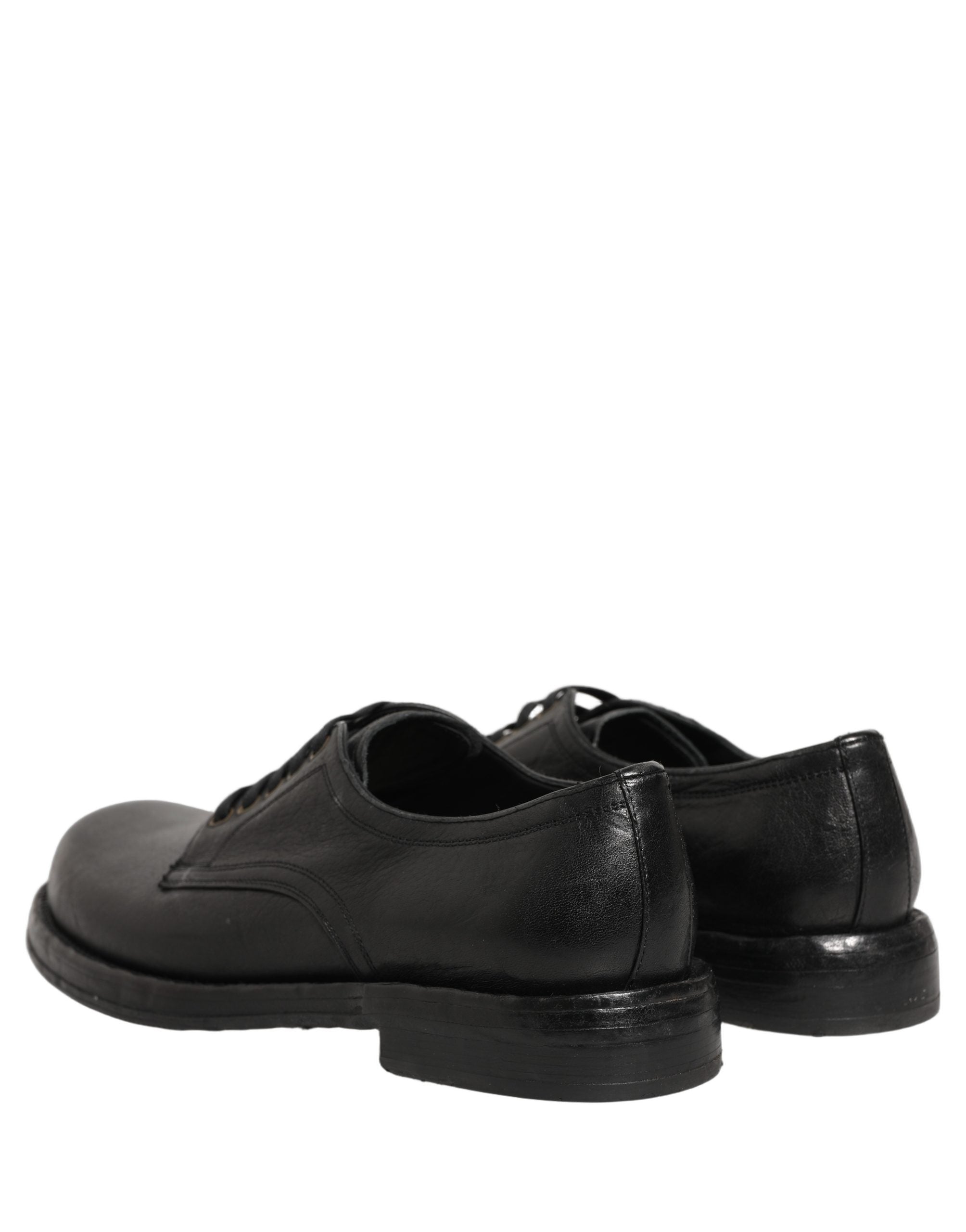 Chaussures derby en cuir noir Dolce & Gabbana pour hommes avec laçage, style élégant et sophistiqué.