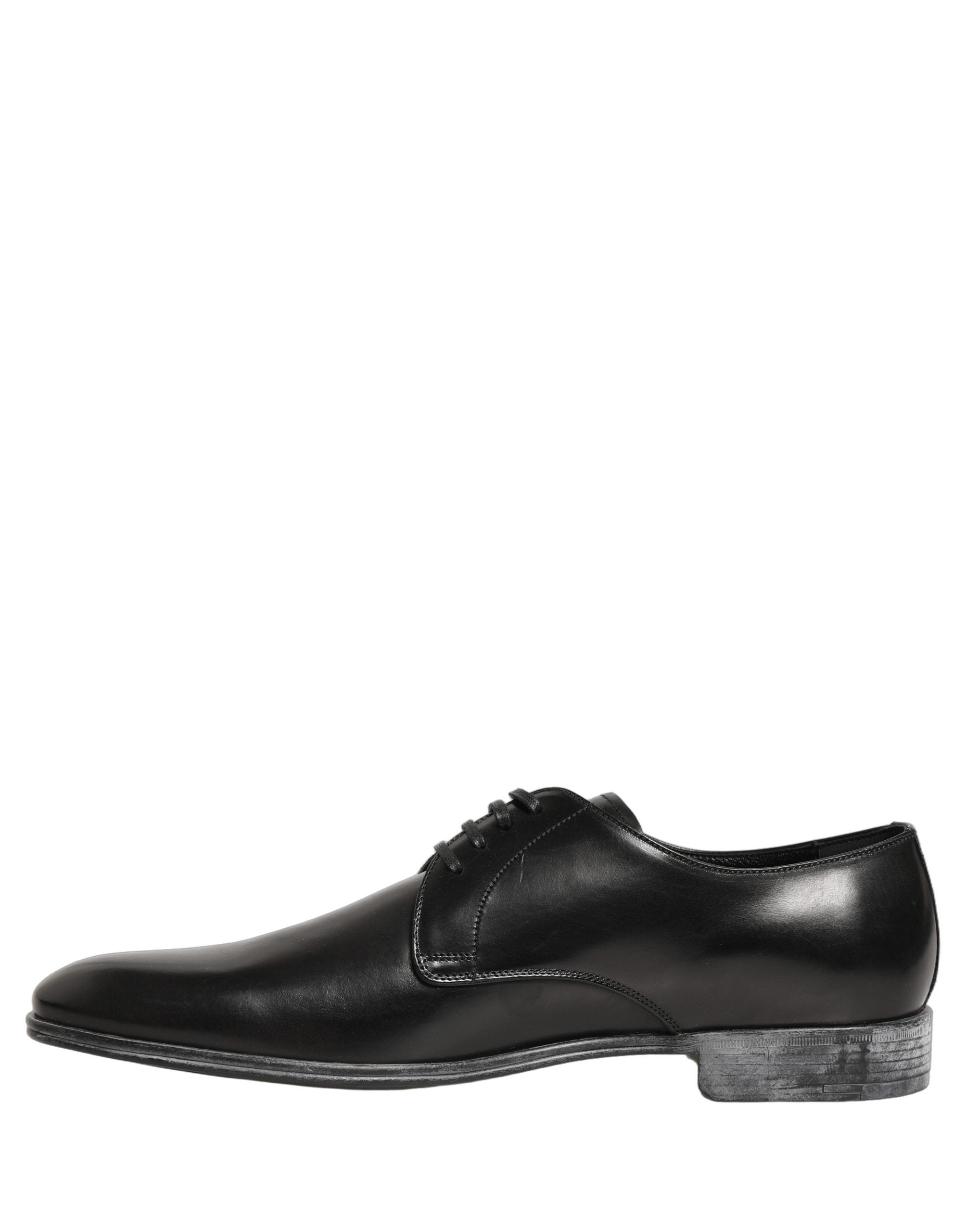 Chaussures Derby en cuir noir Dolce & Gabbana pour homme avec lacets, style élégant et sophistiqué.