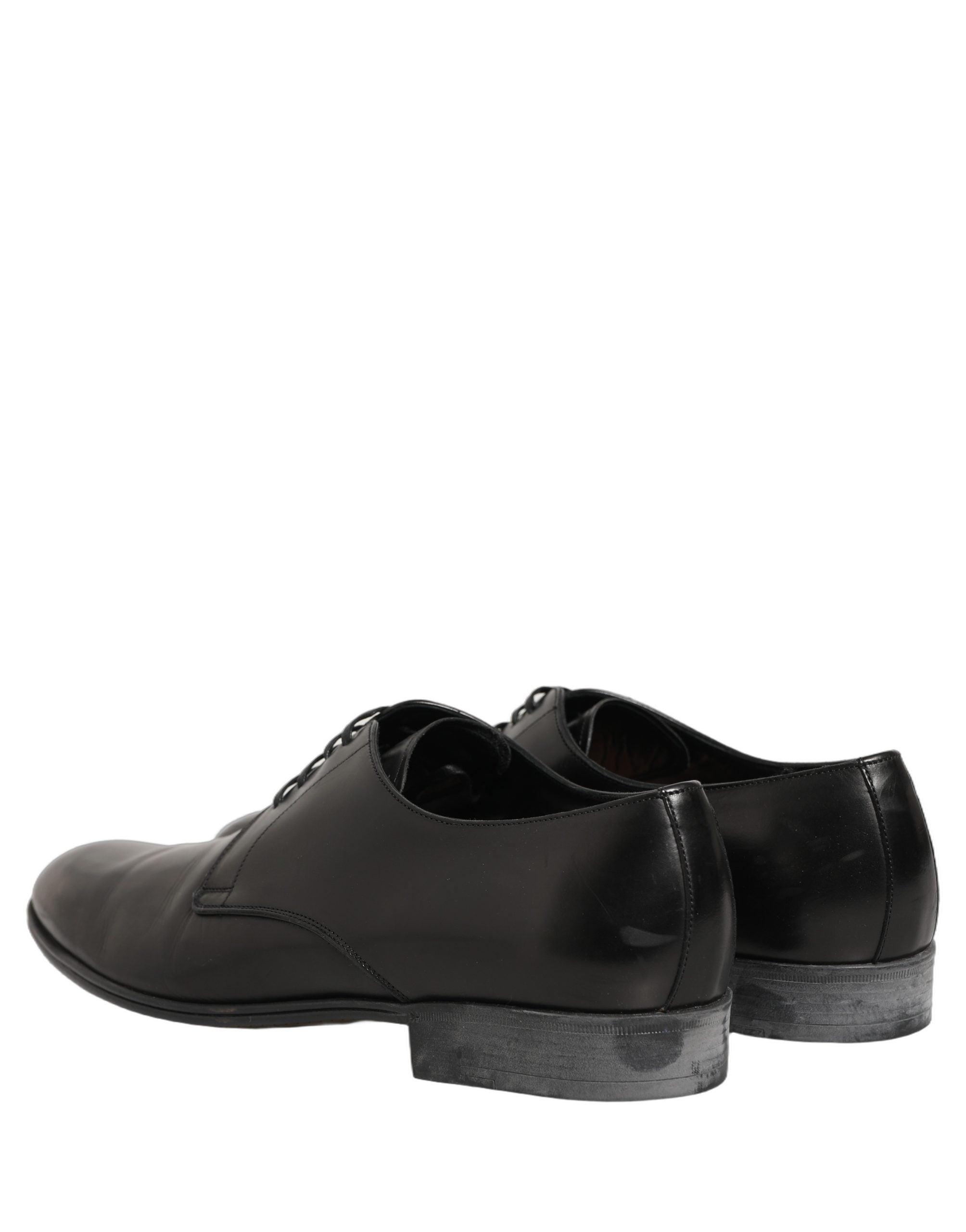 Chaussures Derby en cuir noir Dolce & Gabbana avec laçage, élégantes et sophistiquées, pour un style chic et moderne.